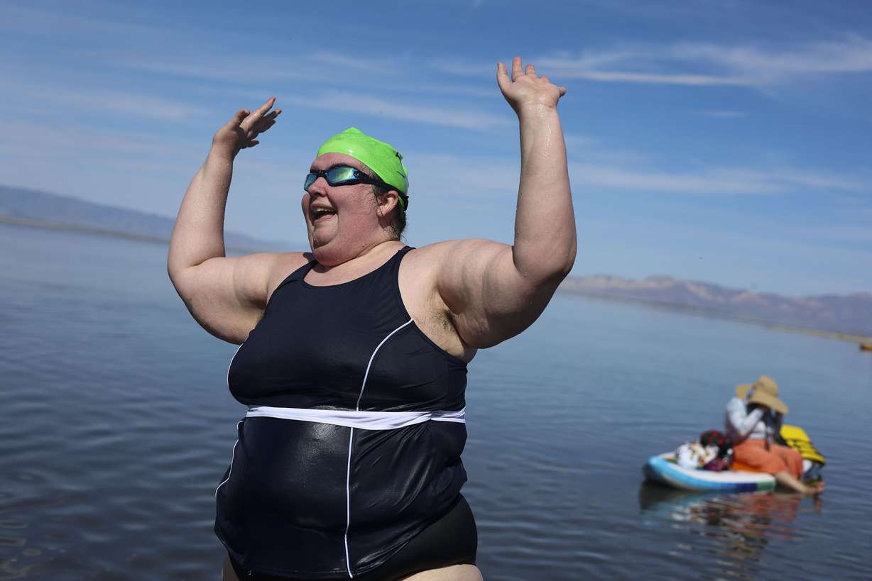 Rachel Wagner celebrates after competing in the 1-mile open swim competition at Great Salt Lake State Park in Magna on June 11. This was Wagner’s sixth time competing in the race.