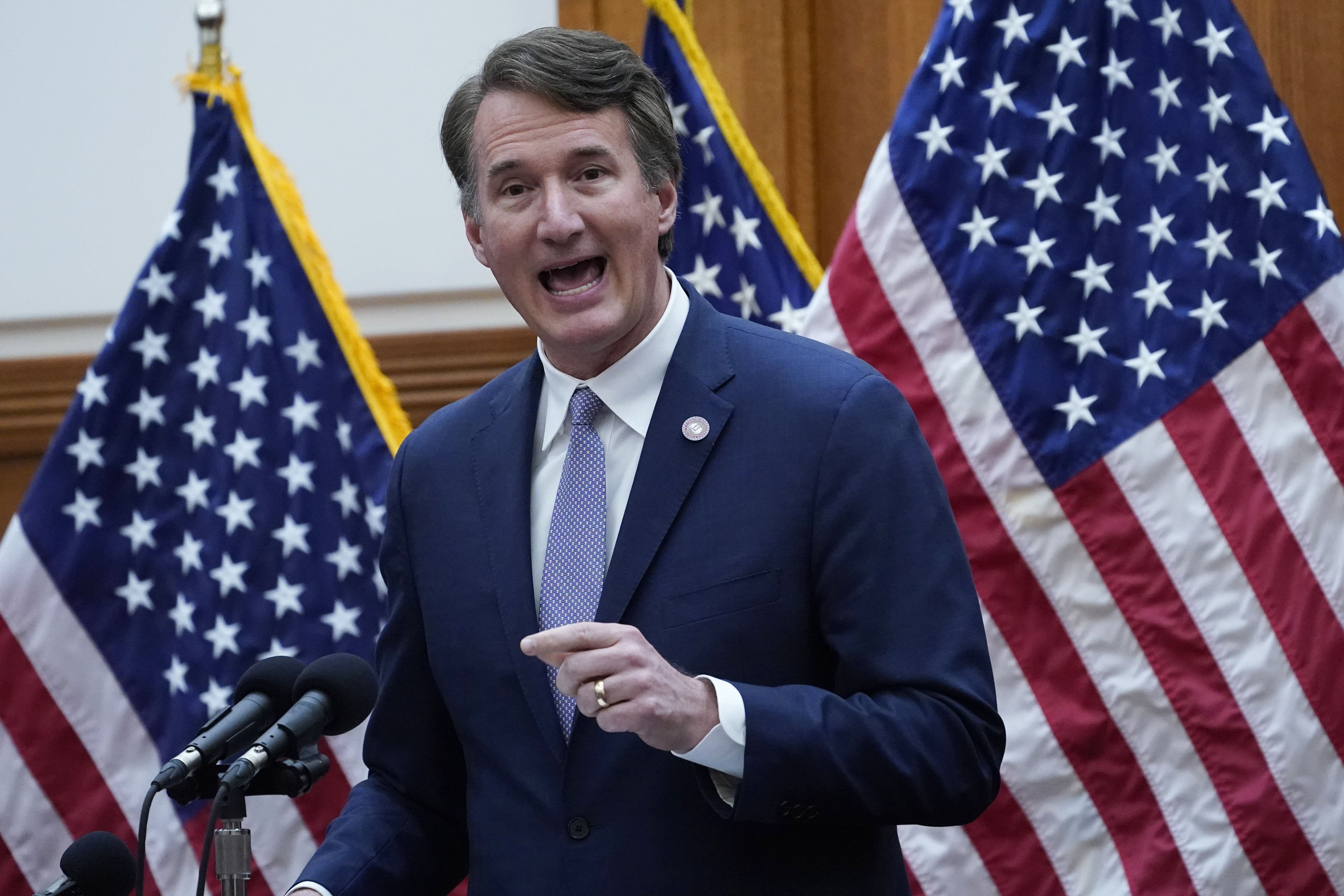 Virginia Gov. Glenn Youngkin speaks during news conference announcing the Department of Education report on education May 19, in Richmond, Va. A GOP sweep of Virginia’s 2021 statewide elections, and particularly Youngkin’s win, appears to have energized the Republican field in two of the country’s most competitive U.S. House races.