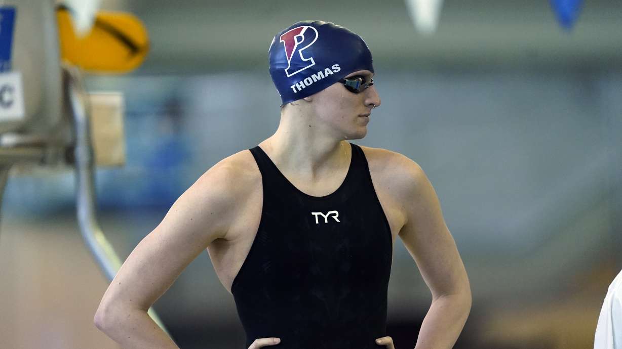 University of Pennsylvania athlete Lia Thomas prepares for an event at the NCAA Swimming and Diving Championships, March 17 in Atlanta. World swimming's governing body adopted a new policy Sunday that effectively bans transgender women from competing in women's events, starting Monday.