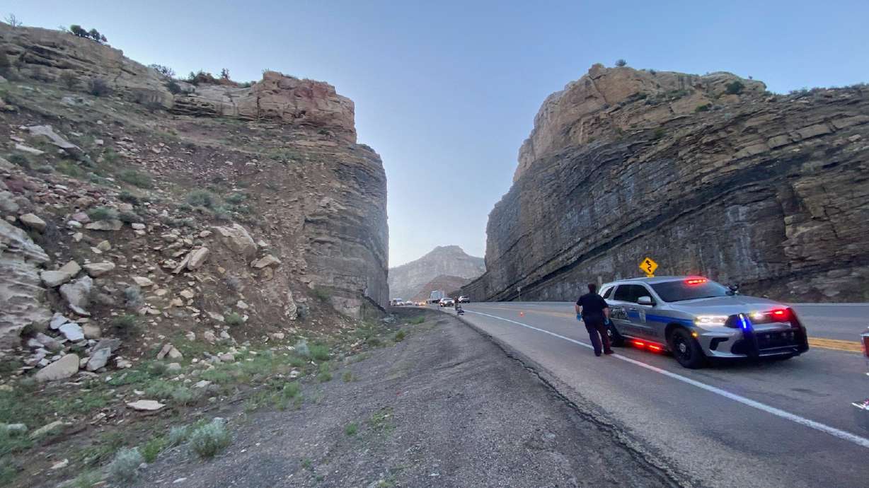 Two people in an SUV on U.S. 6 were injured Sunday when two large rocks crashed through their windshield.