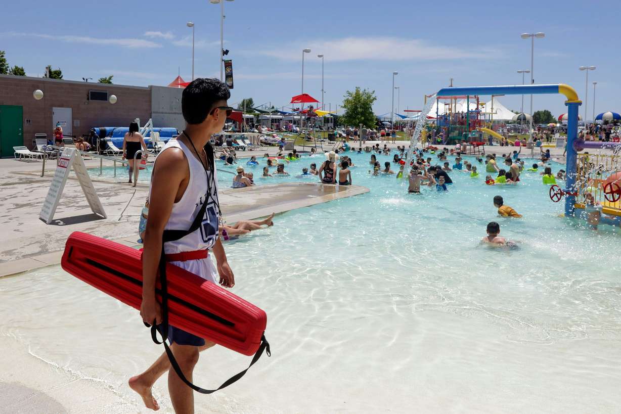 A lifeguard at the Kearns Oquirrh Park Fitness Center watches swimmers at the pool in Kearns on June 10.