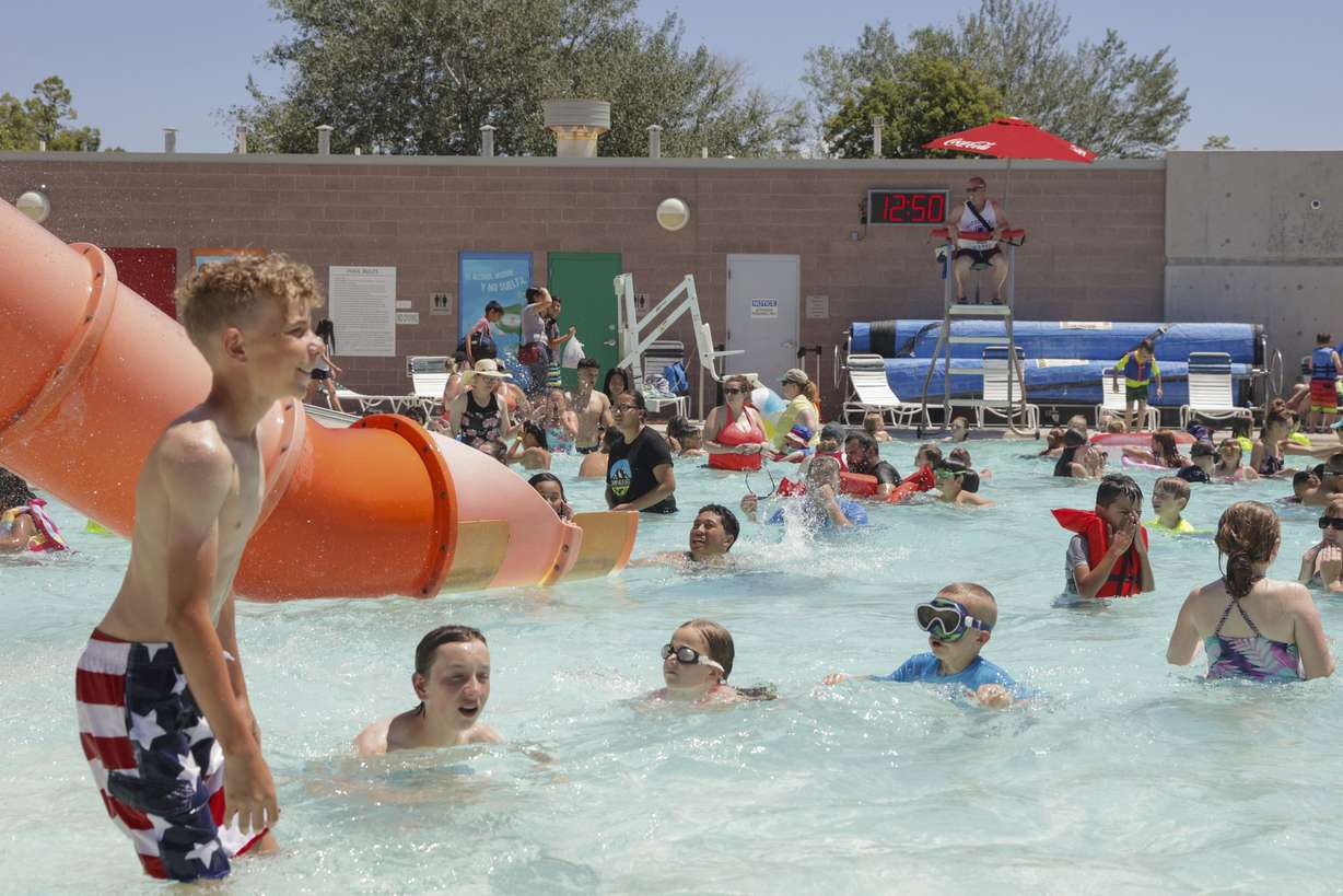 Lifeguard Mark Black watches swimmers at the Kearns Oquirrh Park Fitness Center pool in Kearns on June 10.