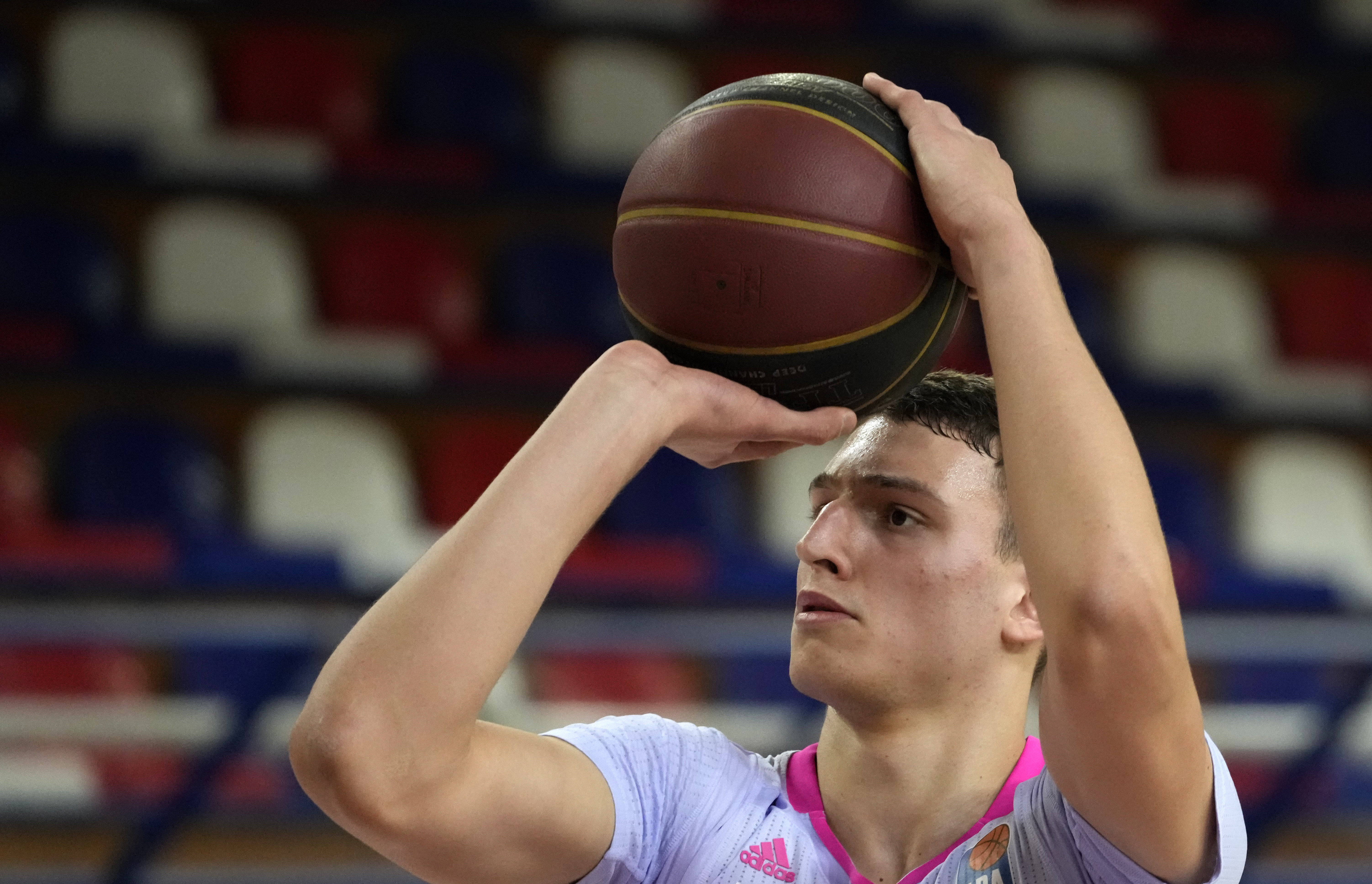 FILE - Mega's Nikola Jovic tries to score during the ABA League basketball match between FMP and Mega in Belgrade, Serbia, Saturday, Jan. 29, 2022.  Jovic, of Serbia, is one of the top international prospects heading into this year's NBA draft. 