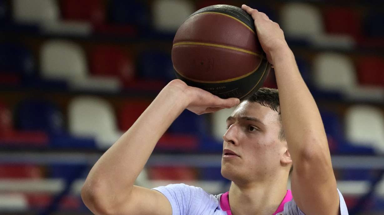 FILE - Mega's Nikola Jovic tries to score during the ABA League basketball match between FMP and Mega in Belgrade, Serbia, Saturday, Jan. 29, 2022. Jovic, of Serbia, is one of the top international prospects heading into this year's NBA draft.