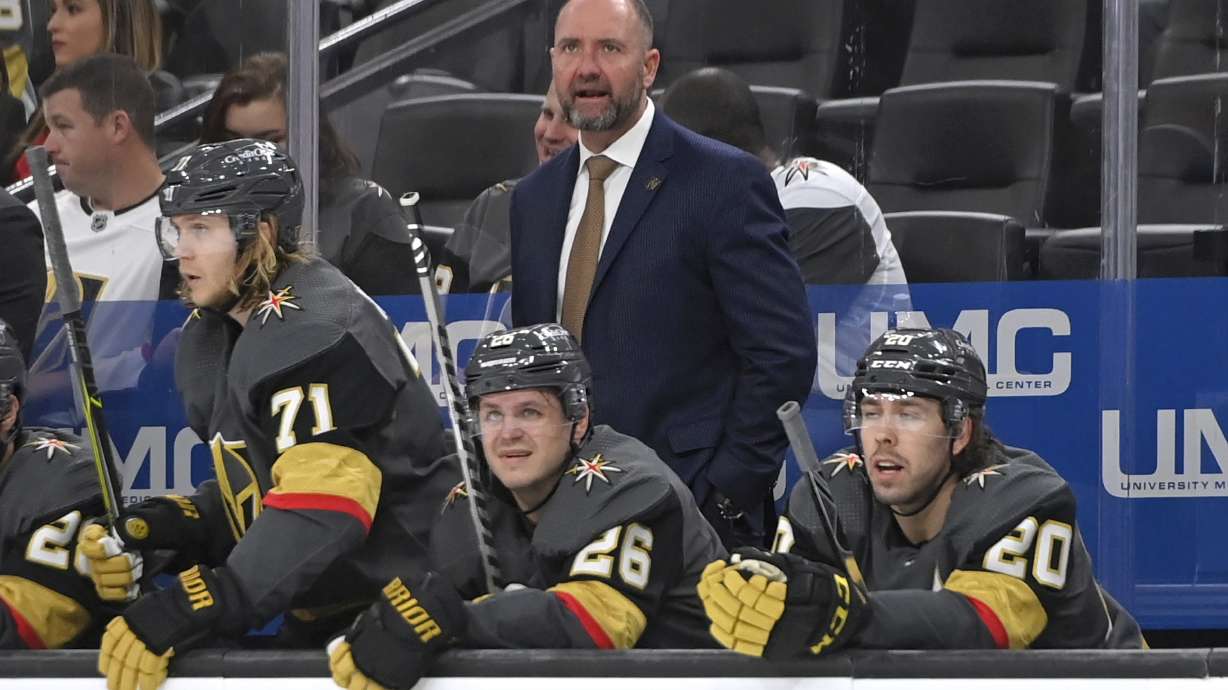 FILE - Vegas Golden Knights coach Peter DeBoer watches from the bench during the third period of the team's NHL hockey game against the Nashville Predators on Thursday, March 24, 2022, in Las Vegas. The Dallas Stars announced Tuesday, June 21, 2022, that they have hired Peter DeBoer as their new coach, a month after he was fired by the Vegas Golden Knights.