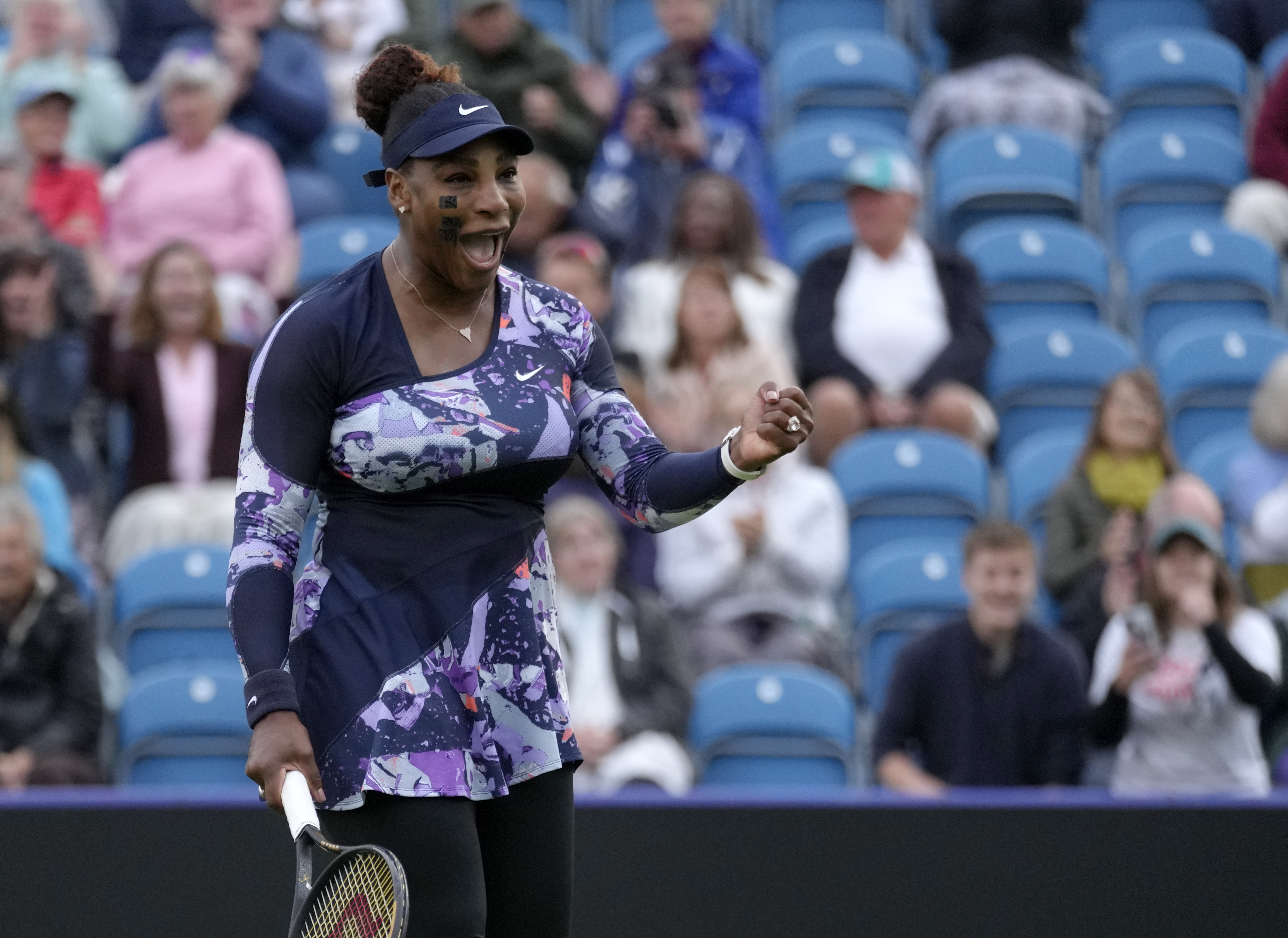 Serena Williams of the United States celebrates after wining their doubles tennis match with Ons Jabeur of Tunisia against Marie Bouzkova of Czech Republic and Sara Sorribes Tormo of Spain at the Eastbourne International tennis tournament in Eastbourne, England, Tuesday, June 21, 2022. 