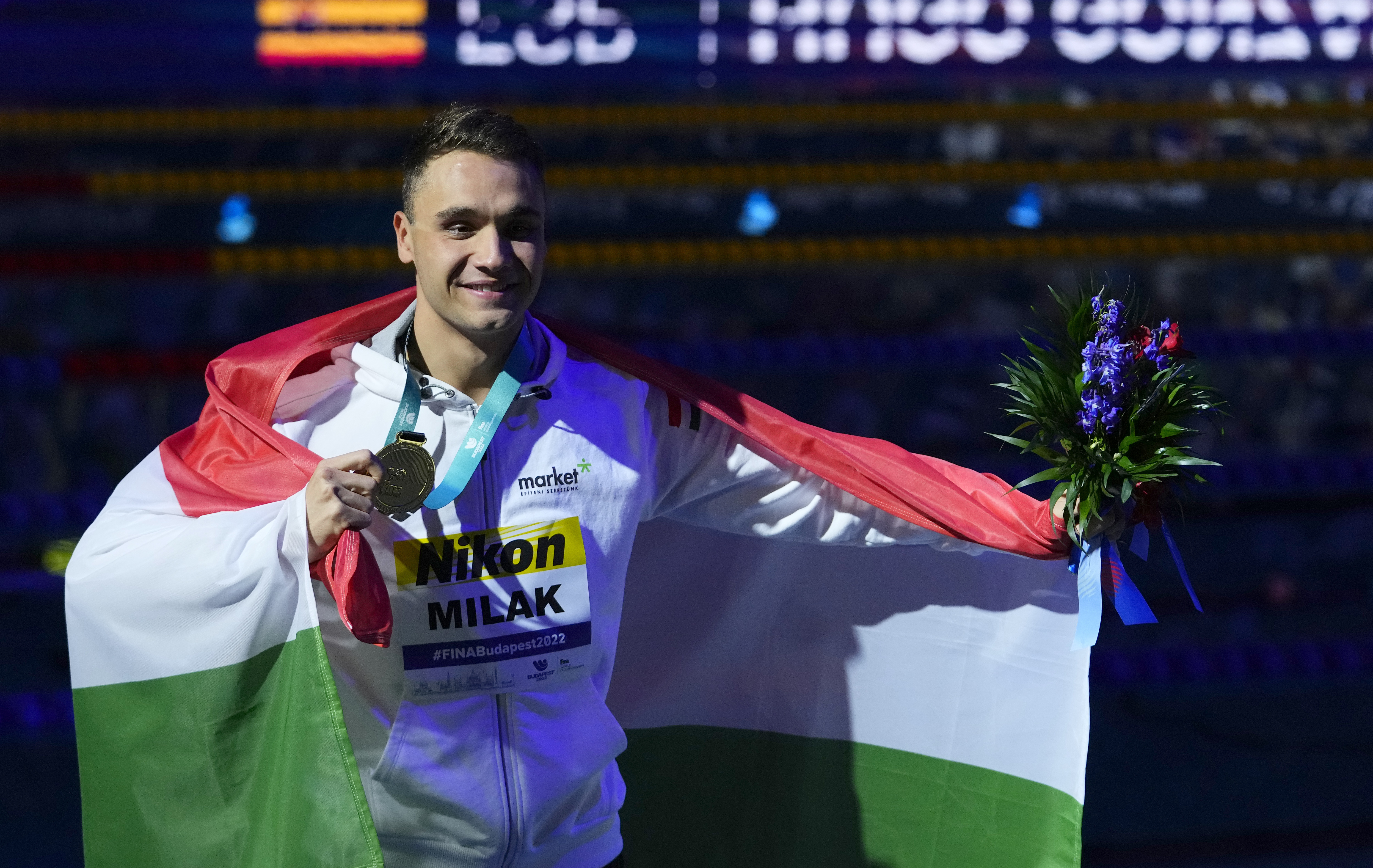 Kristof Milak of Hungary celebrate after winning the Men 200m Butterfly final at the 19th FINA World Championships in Budapest, Hungary, Tuesday, June 21, 2022. 