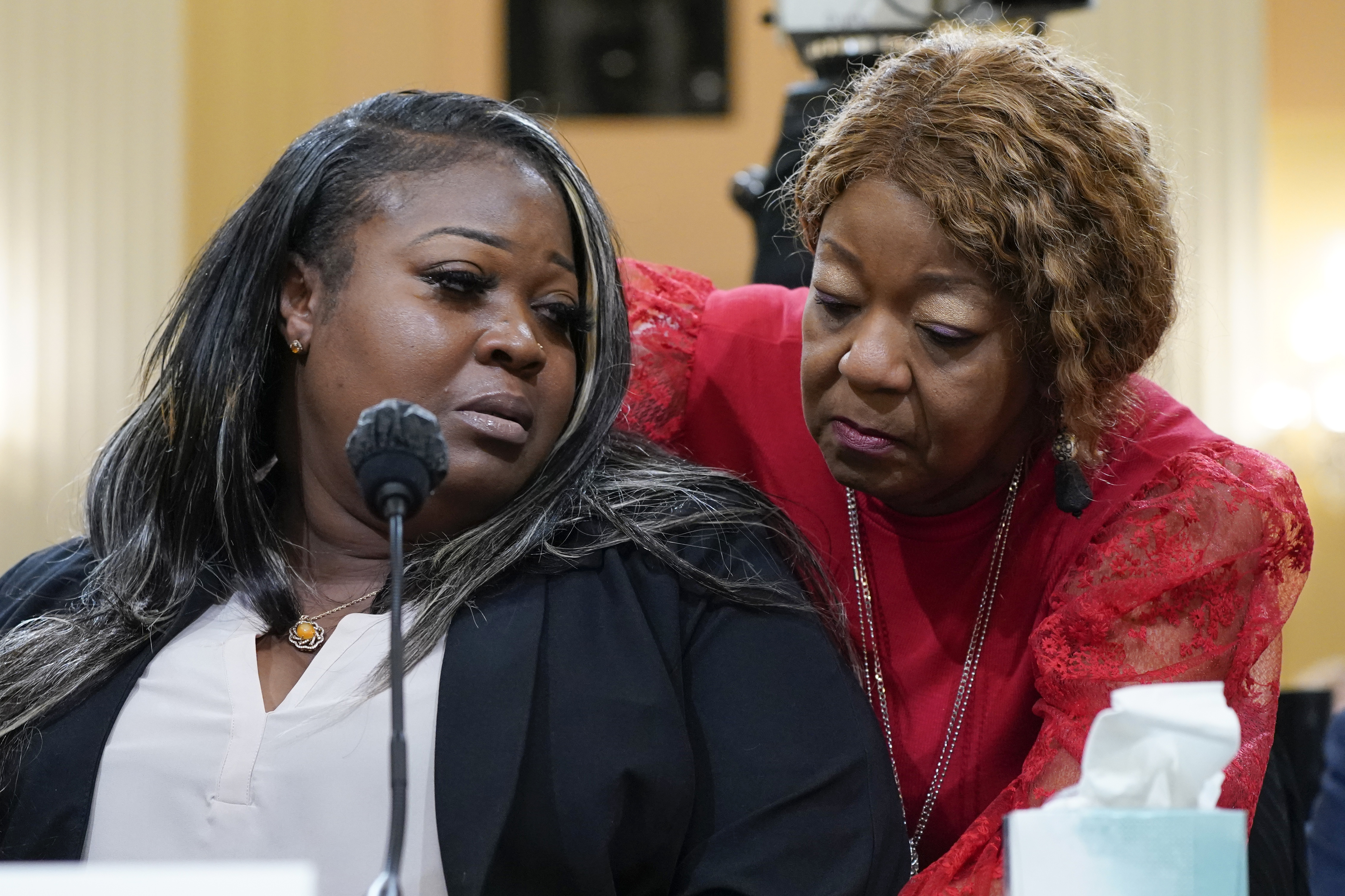 Wandrea "Shaye" Moss, a former Georgia election worker, is comforted by her mother Ruby Freeman, right, as the House select committee investigating the Jan. 6 attack on the U.S. Capitol continues to reveal its findings of a year-long investigation, at the Capitol in Washington, Tuesday.