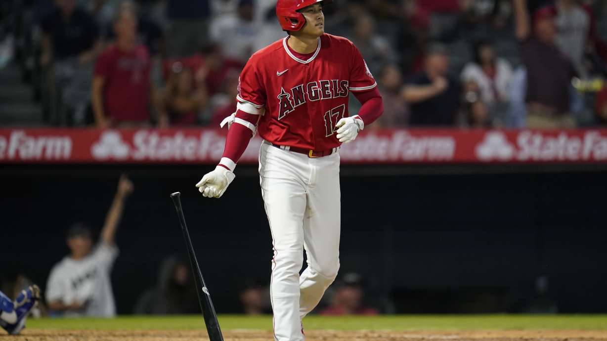 Los Angeles Angels designated hitter Shohei Ohtani (17) runs the bases after hitting a home run during the sixth inning of a baseball game against the Kansas City Royals in Anaheim, Calif., Tuesday, June 21, 2022. Taylor Ward and Mike Trout also scored.