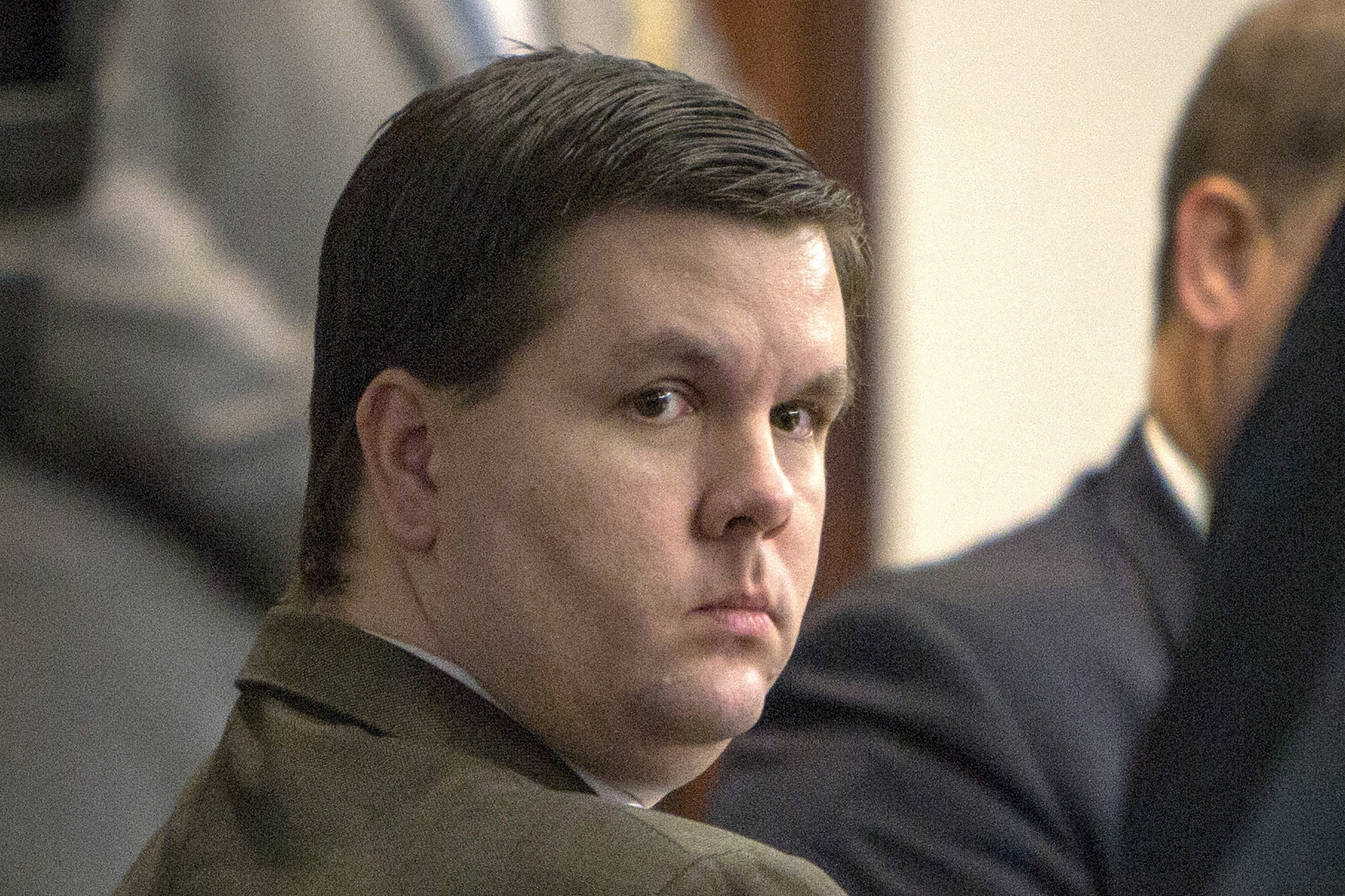 Justin Ross Harris listens during his trial at the Glynn County Courthouse in Brunswick, Ga., on Oct. 3, 2016. Georgia's highest court on Wednesday, overturned the murder and child cruelty convictions against Harris, whose toddler son died after he left him in a hot car for hours, saying the jury saw evidence that was “extremely and unfairly prejudicial.”