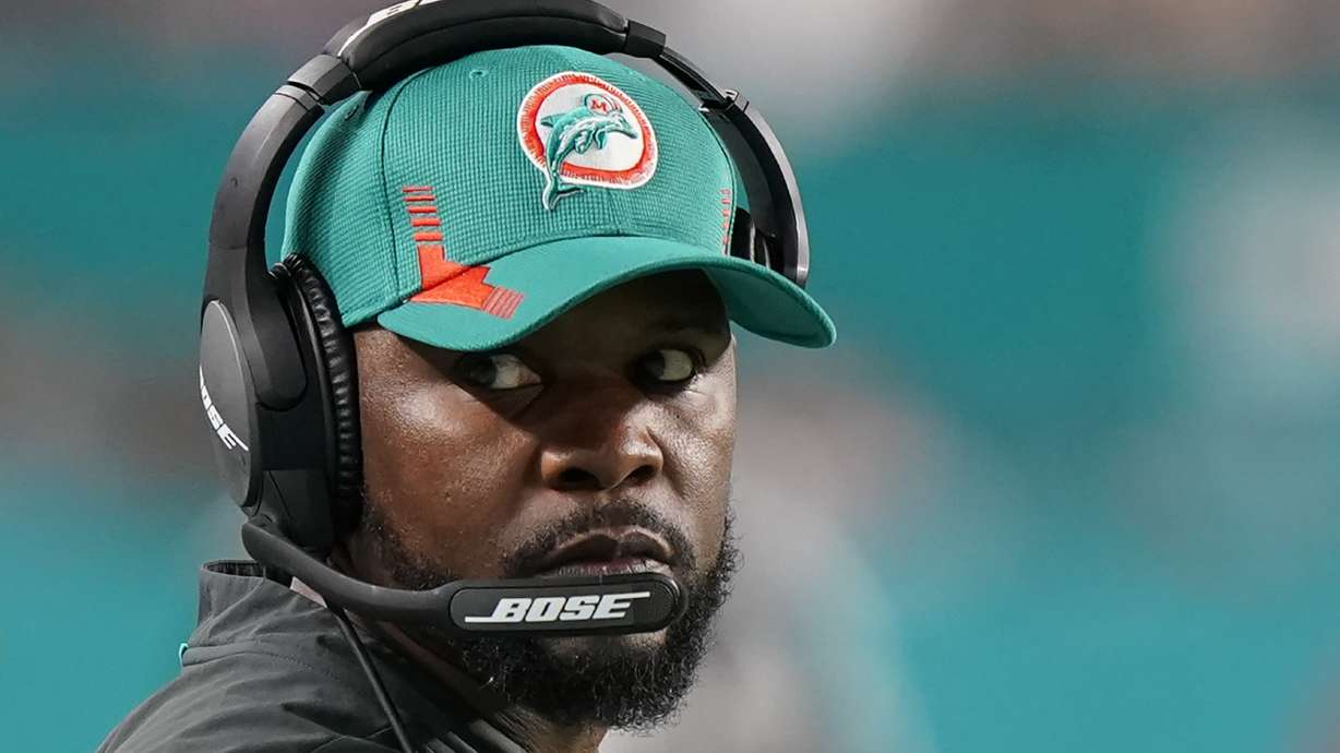 FILE - Miami Dolphins head coach Brian Flores during the second half of an NFL football game against the New England Patriots on Jan. 9, 2022, in Miami Gardens, Fla. The NFL and six of its teams have formally moved in a New York court to force a lawsuit alleging that they engaged in racial discrimination into arbitration where NFL Commissioner Roger Goodell would be the arbitrator. The league and the teams filed papers Tuesday, June 21, 2022, with a judge presiding over a lawsuit filed by Flores after he was fired in January as head coach of the Miami Dolphins.