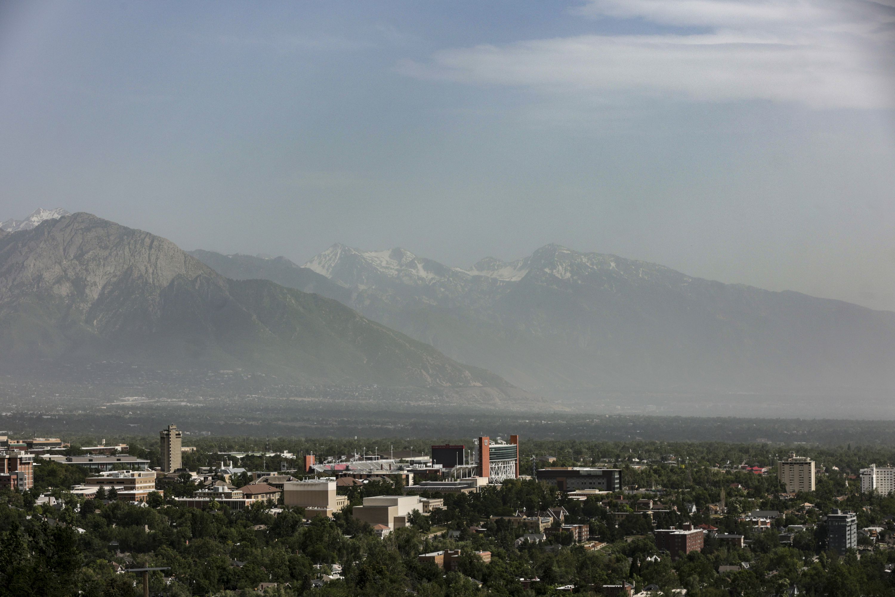 Wind-blown dust obscures the Salt Lake Valley on June 12. Salt Lake City is one of three cities across the United States where residents can get an air tracker to determine where air pollution is coming from.