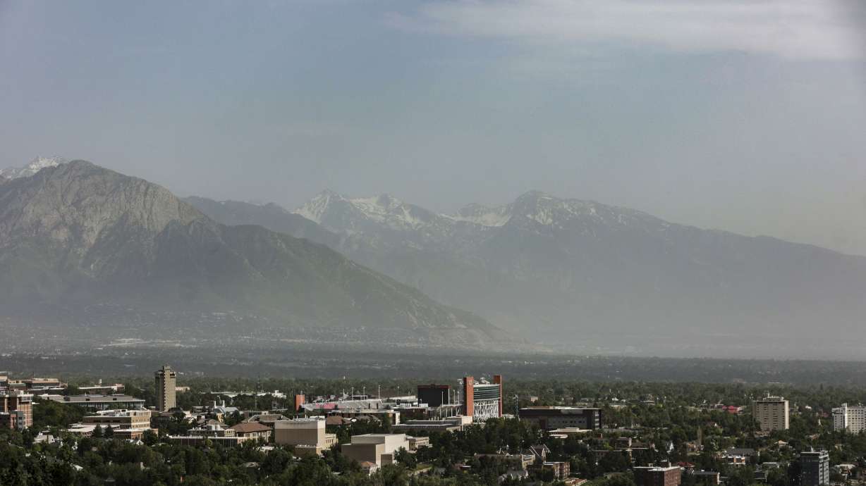 Wind-blown dust obscures the Salt Lake Valley on June 12. Salt Lake City is one of three cities across the United States where residents can get an air tracker to determine where air pollution is coming from.
