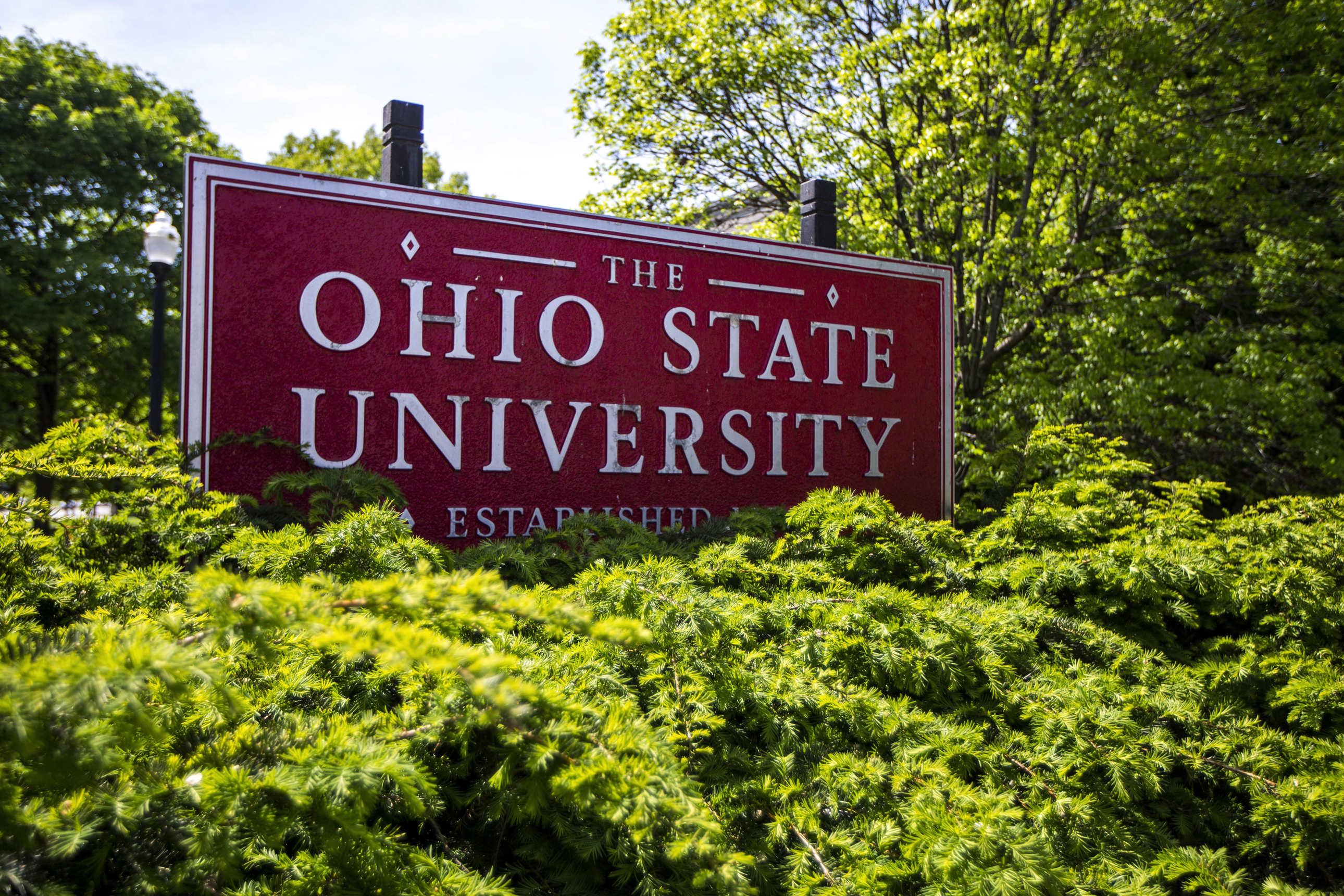 FILE - This May 8, 2019, photo, shows a sign for The Ohio State University in Columbus, Ohio. Ohio State University has won its fight to trademark the word "The." The U.S. Patent and Trademark Office approved the university's request Tuesday, June 21, 2022. The school says it allows Ohio State to control use of "The" on branded products associated with and sold through athletics and collegiate channels. 