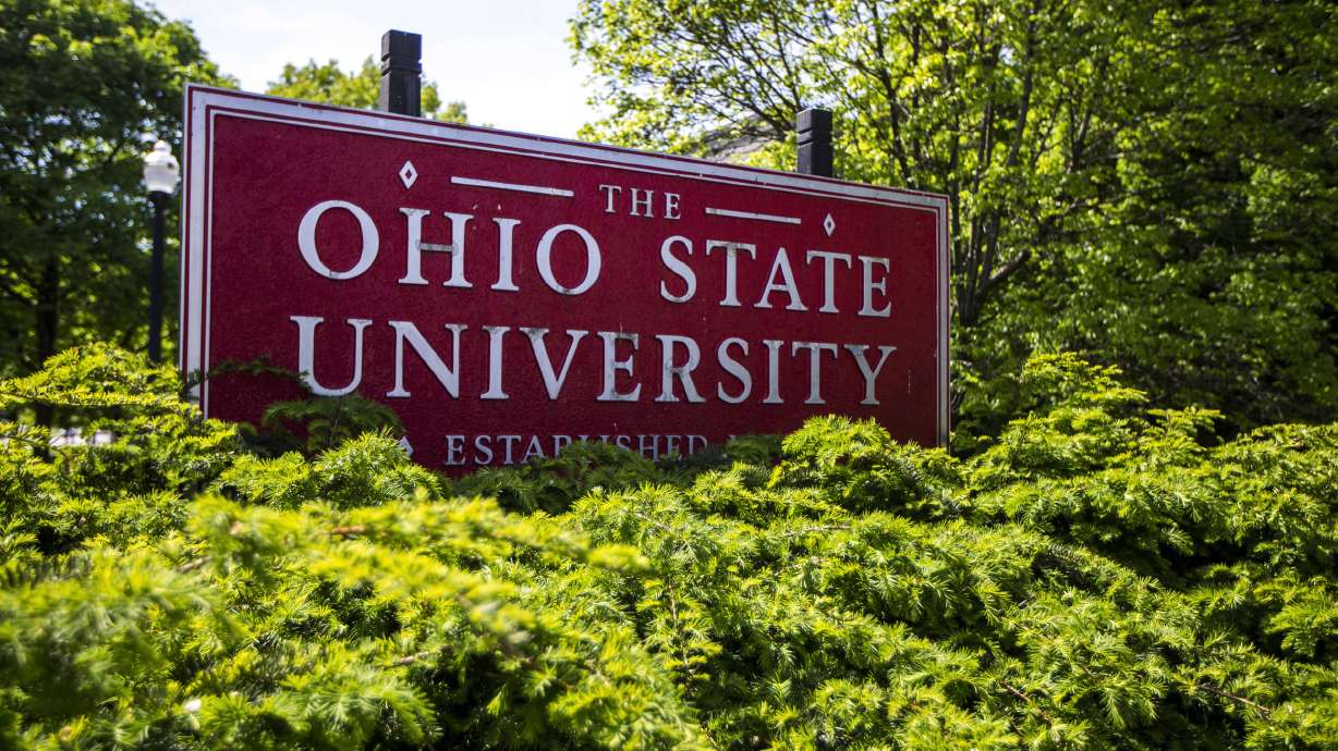 FILE - This May 8, 2019, photo, shows a sign for The Ohio State University in Columbus, Ohio. Ohio State University has won its fight to trademark the word "The." The U.S. Patent and Trademark Office approved the university's request Tuesday, June 21, 2022. The school says it allows Ohio State to control use of "The" on branded products associated with and sold through athletics and collegiate channels.