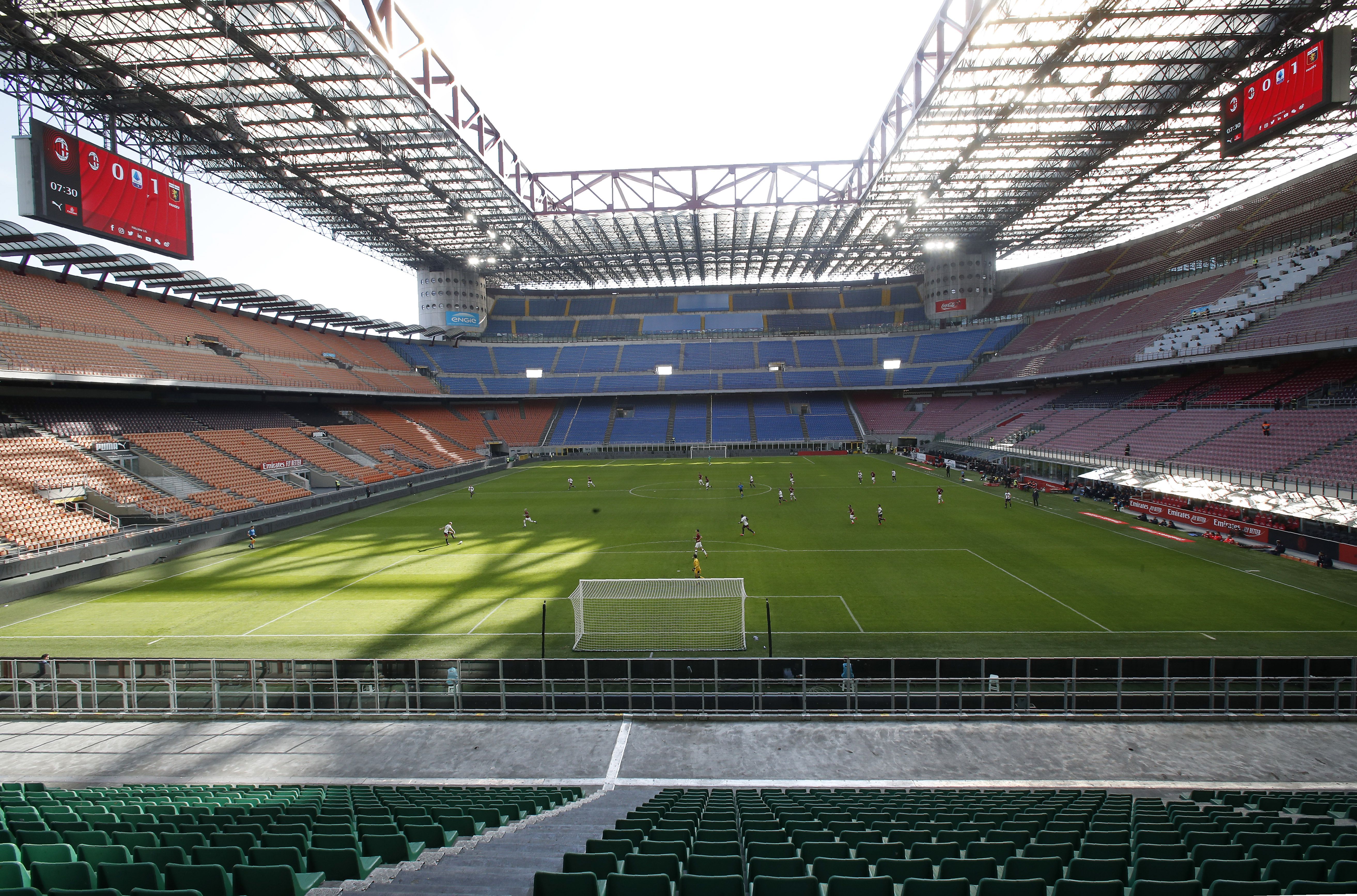 The empty San Siro stadium is pictured before the Serie A soccer match between AC Milan and Genoa in Milan, Italy. Italian leaders are sounding the alarm about the finances of the 2026 Winter Games in Milan and Cortina.