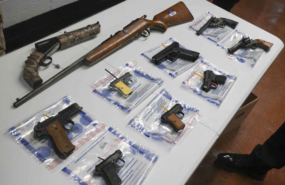 A collection of illegal guns is displayed during a gun buyback event, May 22, 2021 in Brooklyn, N.Y. The Supreme Court said Thursday that Americans have a right to carry guns in public, a major expansion of gun rights. The court struck down a New York gun law in a ruling expected to directly impact half a dozen other populous states.