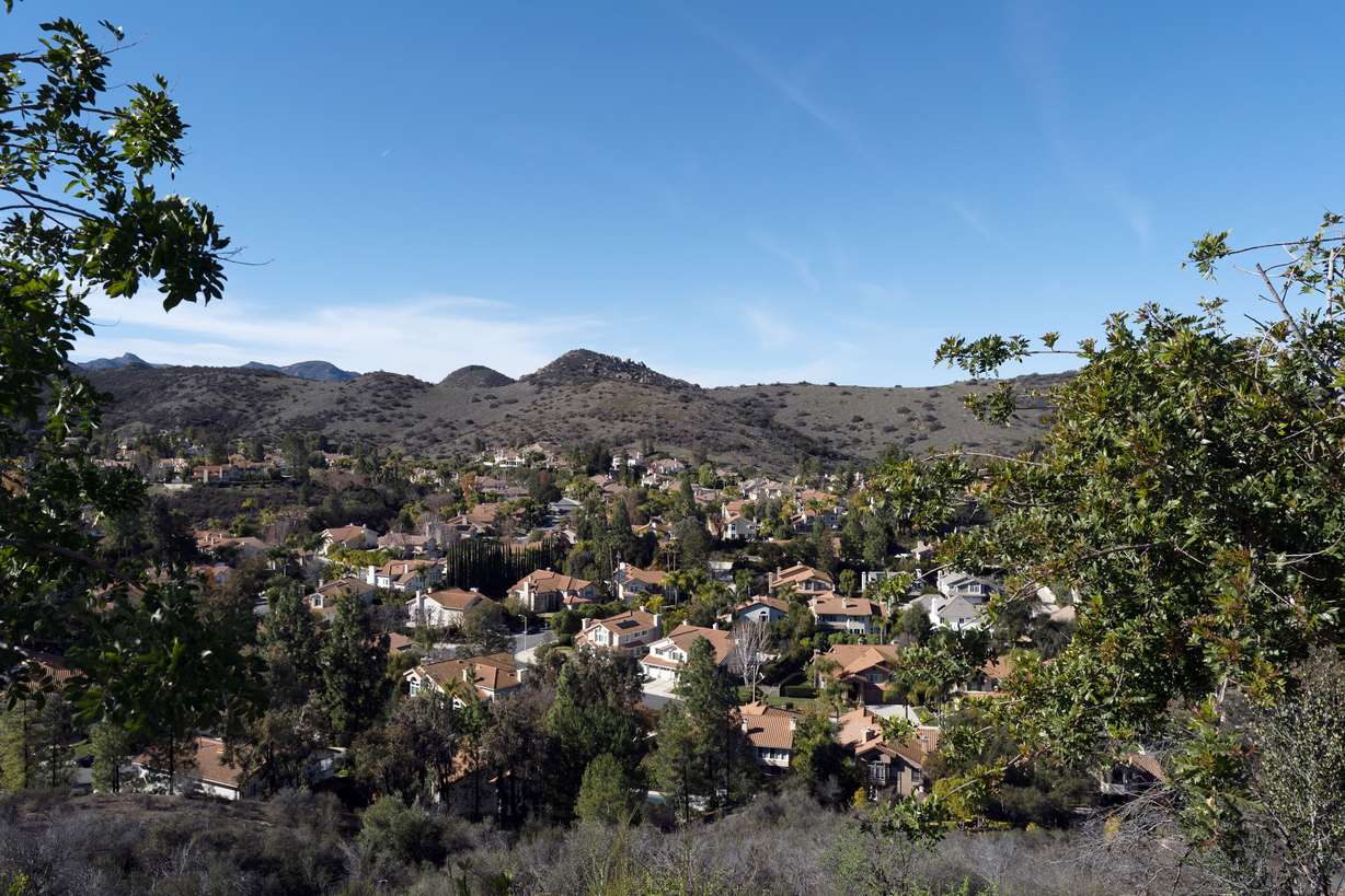 Homes are seen from Las Virgenes Reservoir in Westlake Village, Calif., on Jan. 5. The community, one of the wealthiest neighborhoods in the greater Los Angeles area, is served by the Las Virgenes Municipal Water District.
