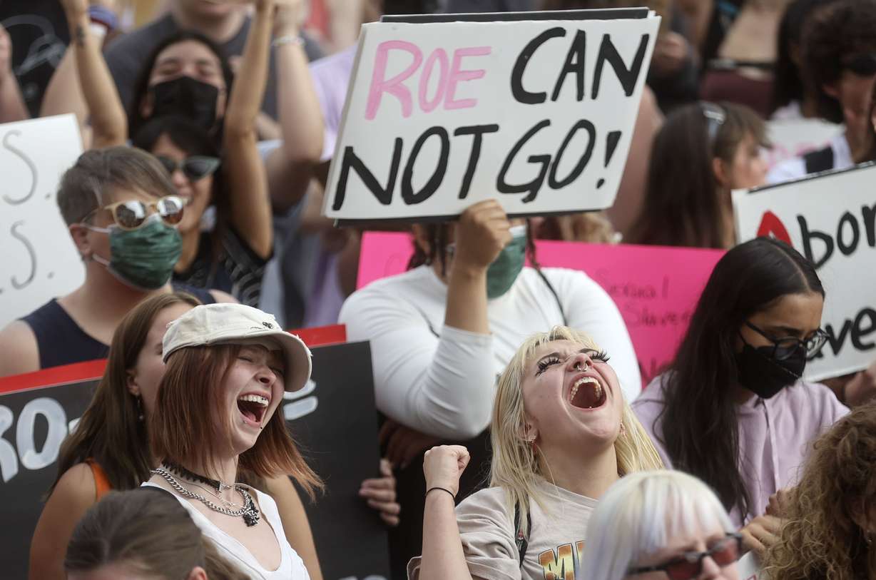 Paytien Hensley and Candra Mackey cheer during an abortion-rights rally in front of the Capitol in Salt Lake City on May 5, 2022.