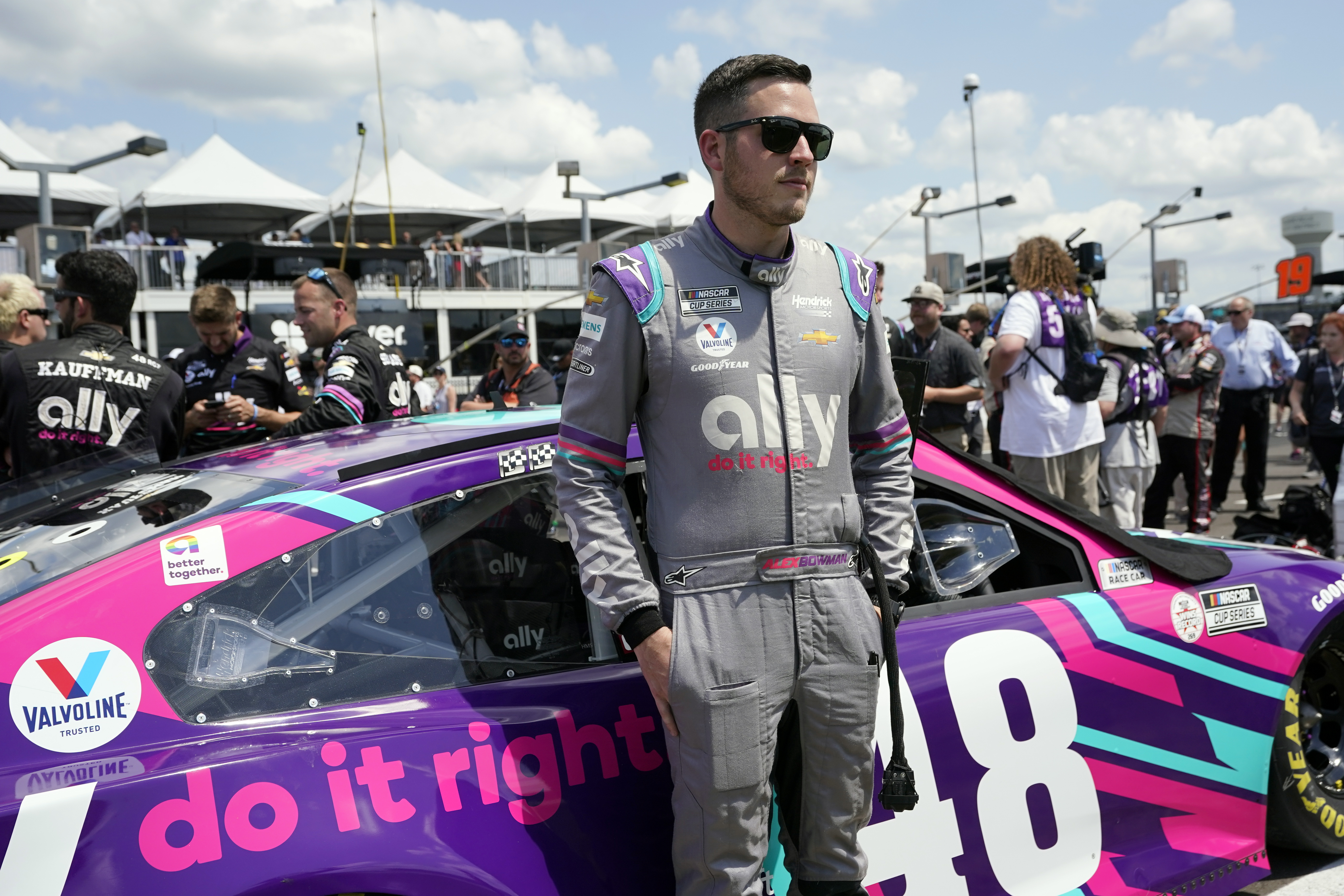 FILE - Alex Bowman waits for the start of a NASCAR Cup Series auto race on June 20, 2021, in Lebanon, Tenn. Bowman felt he underperformed last year when NASCAR brought the Cup Series back to the Nashville area for the first time in 37 years.  He's now seeking a stronger showing Sunday, June 26, 2022. 
