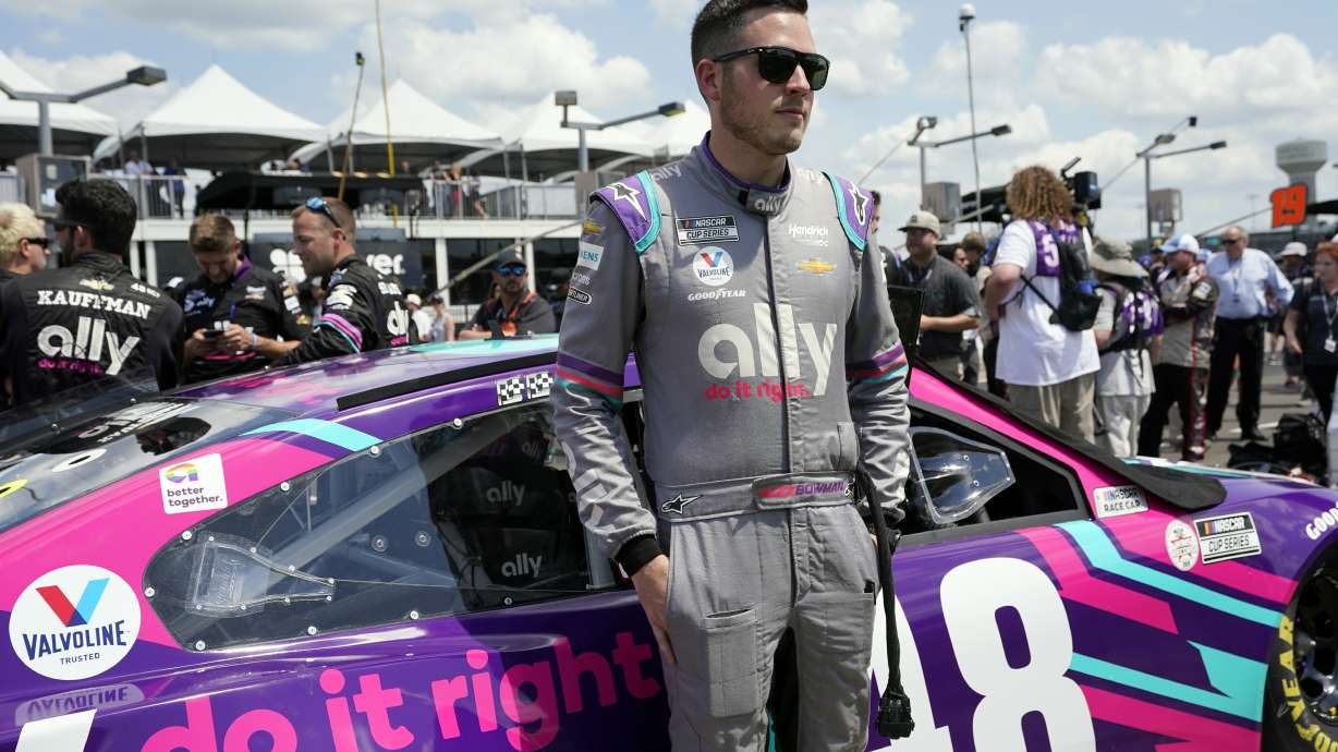 FILE - Alex Bowman waits for the start of a NASCAR Cup Series auto race on June 20, 2021, in Lebanon, Tenn. Bowman felt he underperformed last year when NASCAR brought the Cup Series back to the Nashville area for the first time in 37 years. He's now seeking a stronger showing Sunday, June 26, 2022.