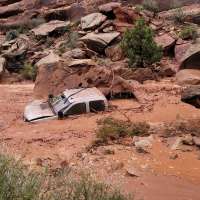 Flash flooding hits southern Utah national parks, closing roads