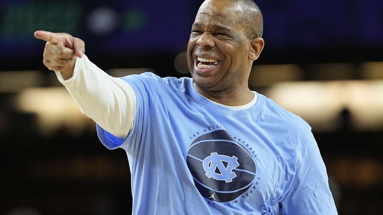 FILE - North Carolina head coach Hubert Davis points during practice at the men's Final Four NCAA college basketball tournament, on April 1, 2022, in New Orleans. National runner-up North Carolina, a strong contender for the No. 1 spot in the preseason polls with four starters returning, will play at Indiana in the ACC/Big Ten Challenge on Nov. 30.