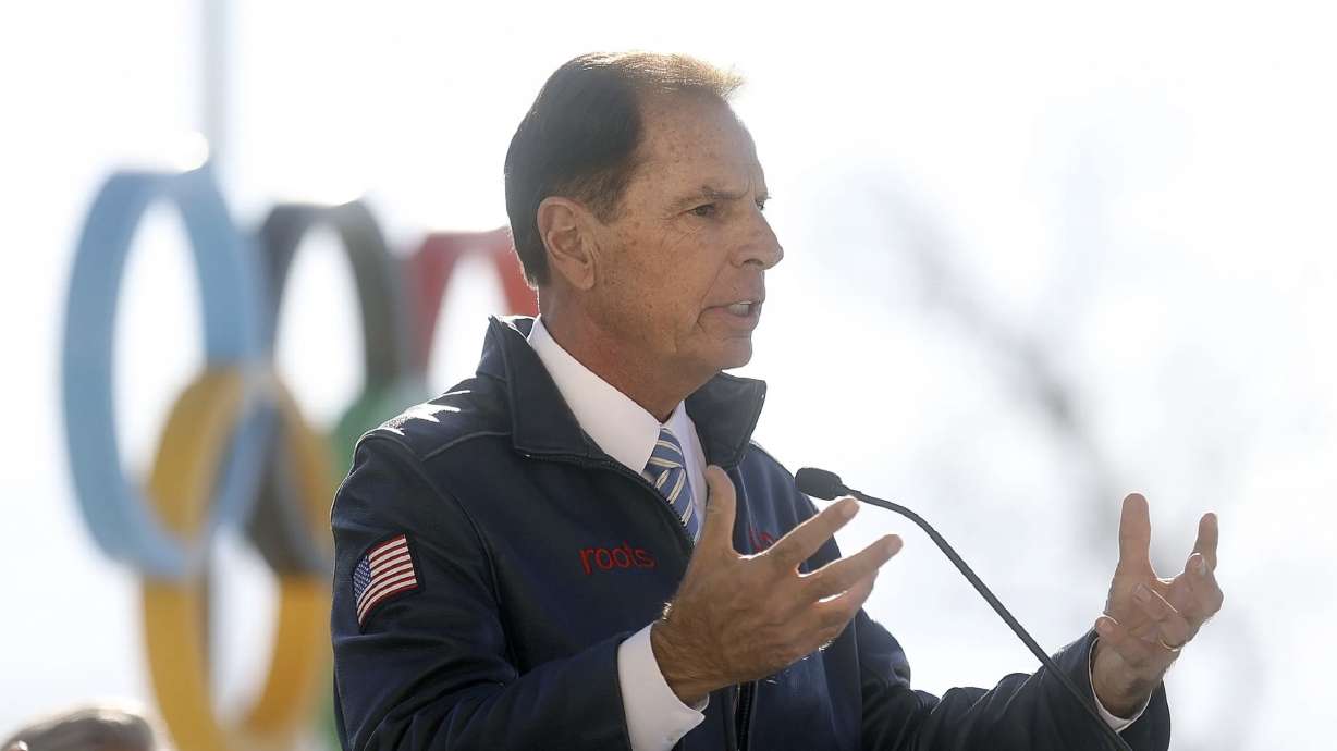 Fraser Bullock, president and CEO of Salt Lake City-Utah Committee for the Games, speaks during an unveiling ceremony for the University of Utah 2002 Olympic and Paralympic Cauldron Plaza at Rice-Eccles Stadium in Salt Lake City on Oct. 29, 2021. International Olympic officials acknowledged Friday that backers of Utah's bid for another Winter Games were told last week that the U.S government should have shown more support for the Beijing Games.