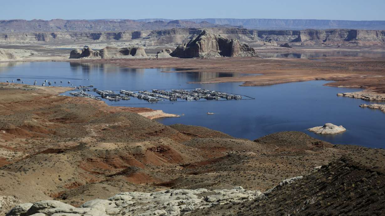 Lake Powell's Wahweap Marina is pictured in Wahweap, Ariz., on March 28, 2021. Campfires in approved areas are allowed in the Glen Canyon Powell Recreation Area and Rainbow Bridge National Monument, park officials said Friday.