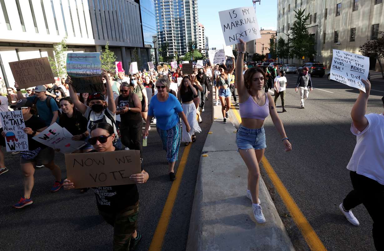 Protesters march from Washington Square Park to the Capitol in response to the Supreme Court’s decision to overturn Roe v. Wade in Salt Lake City on Friday, June 24, 2022.