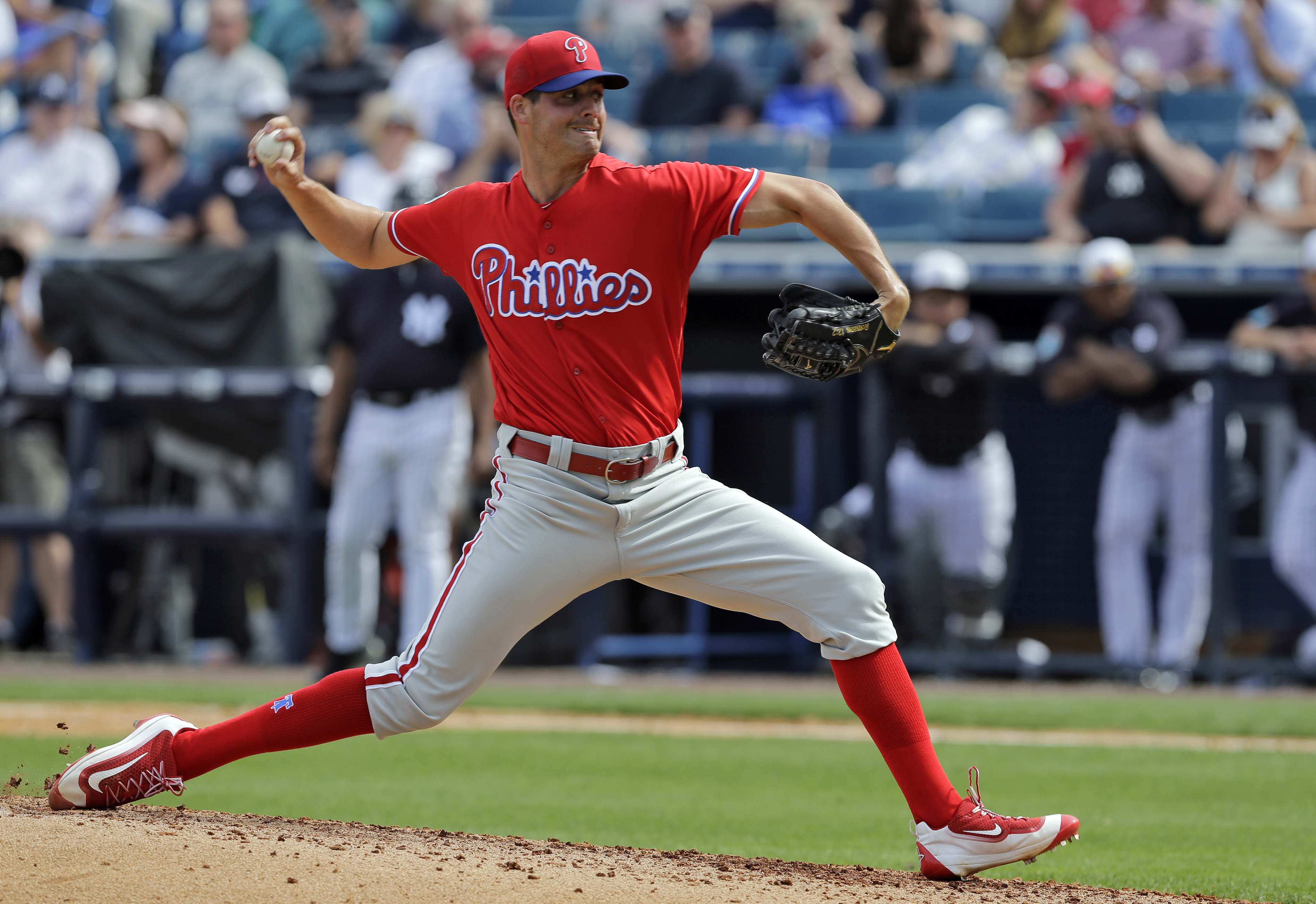 FILE - In this Thursday, March 3, 2016 file photo, Philadelphia Phillies starting pitcher Mark Appel delivers to the New York Yankees during the sixth inning of a spring training baseball game in Tampa, Fla. Appel is a big league ballplayer nine years after he was selected No. 1 overall in the amateur draft. Appel has been promoted by the Philadelphia Phillies. The right-hander, who turns 31 on July 15, went 5-0 with a 1.61 ERA in 19 appearances for Triple-A Lehigh Valley.  