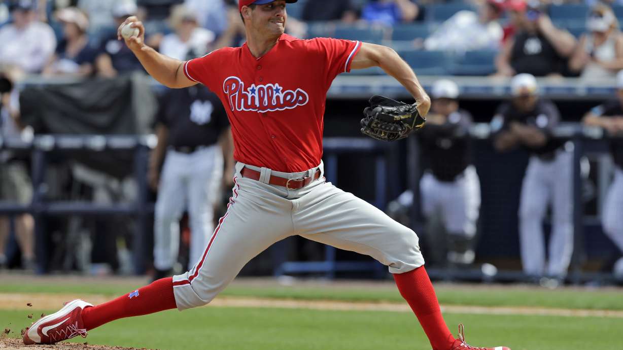 FILE - In this Thursday, March 3, 2016 file photo, Philadelphia Phillies starting pitcher Mark Appel delivers to the New York Yankees during the sixth inning of a spring training baseball game in Tampa, Fla. Appel is a big league ballplayer nine years after he was selected No. 1 overall in the amateur draft. Appel has been promoted by the Philadelphia Phillies. The right-hander, who turns 31 on July 15, went 5-0 with a 1.61 ERA in 19 appearances for Triple-A Lehigh Valley.