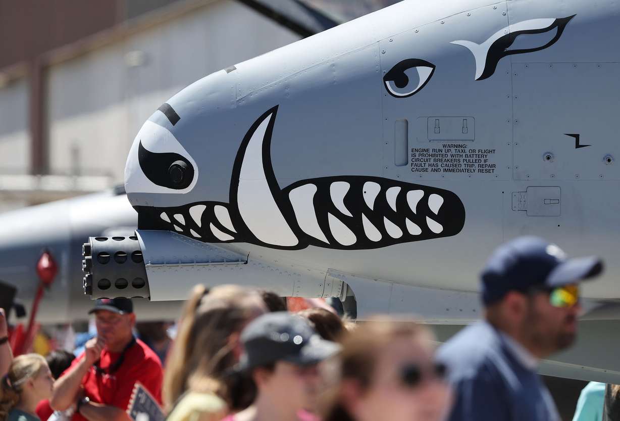 Attendees wander though airplanes during Warriors Over the Wasatch Air and Space Show at Hill Air Fore Base in Layton on Saturday.