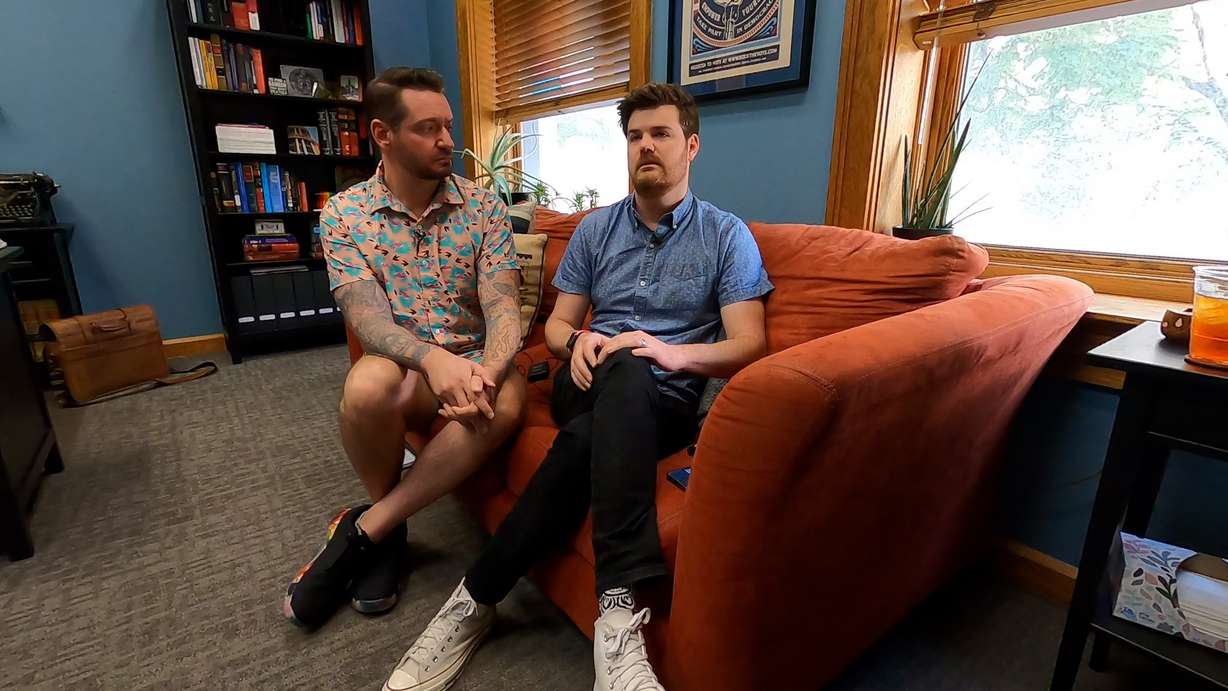 Chris Jensen (left) and his husband, Chris Wharton, talk about the importance of preserving same-sex marriage laws.