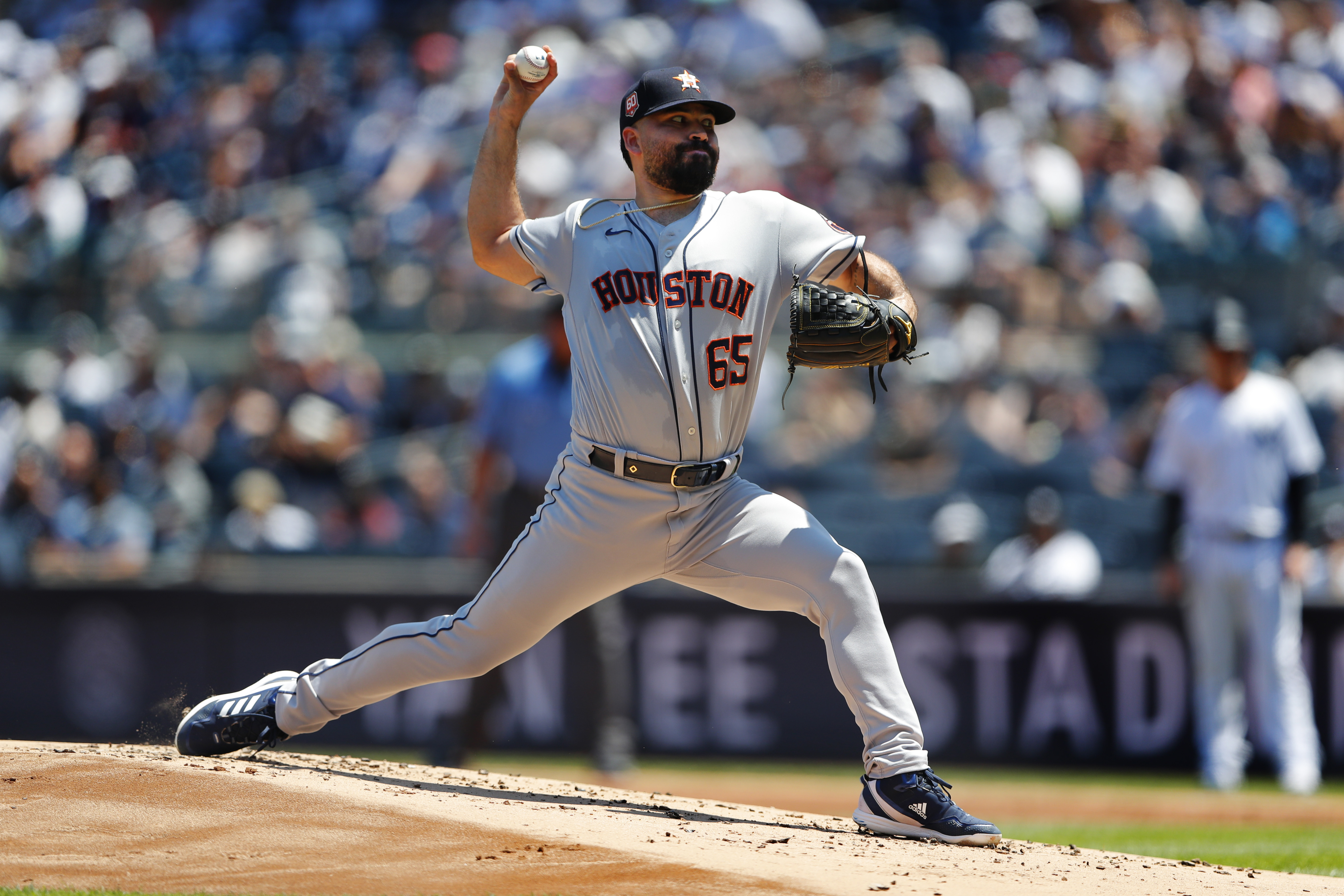 Houston Astros starting pitcher Jose Urquidy (65) throws against the New York Yankees during the first inning of a baseball game, Sunday, June 26, 2022, in New York. 