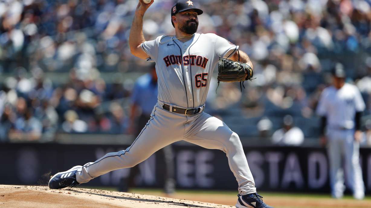Houston Astros starting pitcher Jose Urquidy (65) throws against the New York Yankees during the first inning of a baseball game, Sunday, June 26, 2022, in New York.
