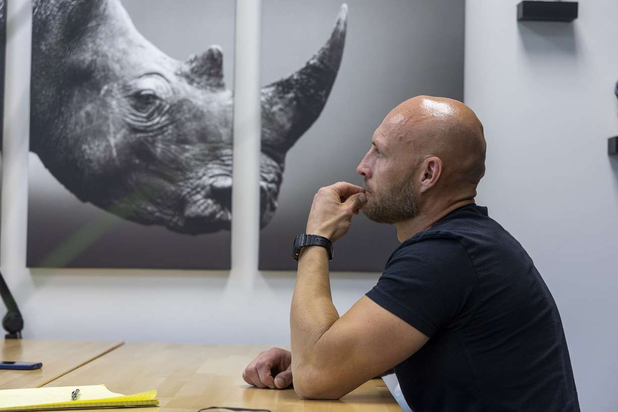 Jefferson Rogers, owner of JKR Windows, rubs his chin as he talks about his path from addiction to success at his office in Draper on Wednesday, June 15.