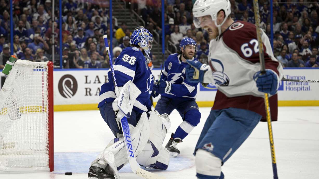 Colorado Avalanche left wing Artturi Lehkonen (62) reacts after scoring on Tampa Bay Lightning goaltender Andrei Vasilevskiy (88) during the second period of Game 6 of the NHL hockey Stanley Cup Finals on Sunday, June 26, 2022, in Tampa, Fla.
