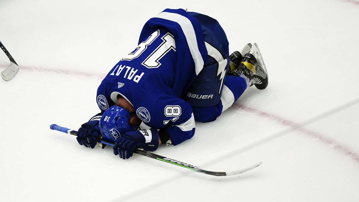 Tampa Bay Lightning left wing Ondrej Palat reacts after the Colorado Avalanche defeated the Lightning 2-1 in Game 6 of the NHL hockey Stanley Cup Finals on Sunday, June 26, 2022, in Tampa, Fla.