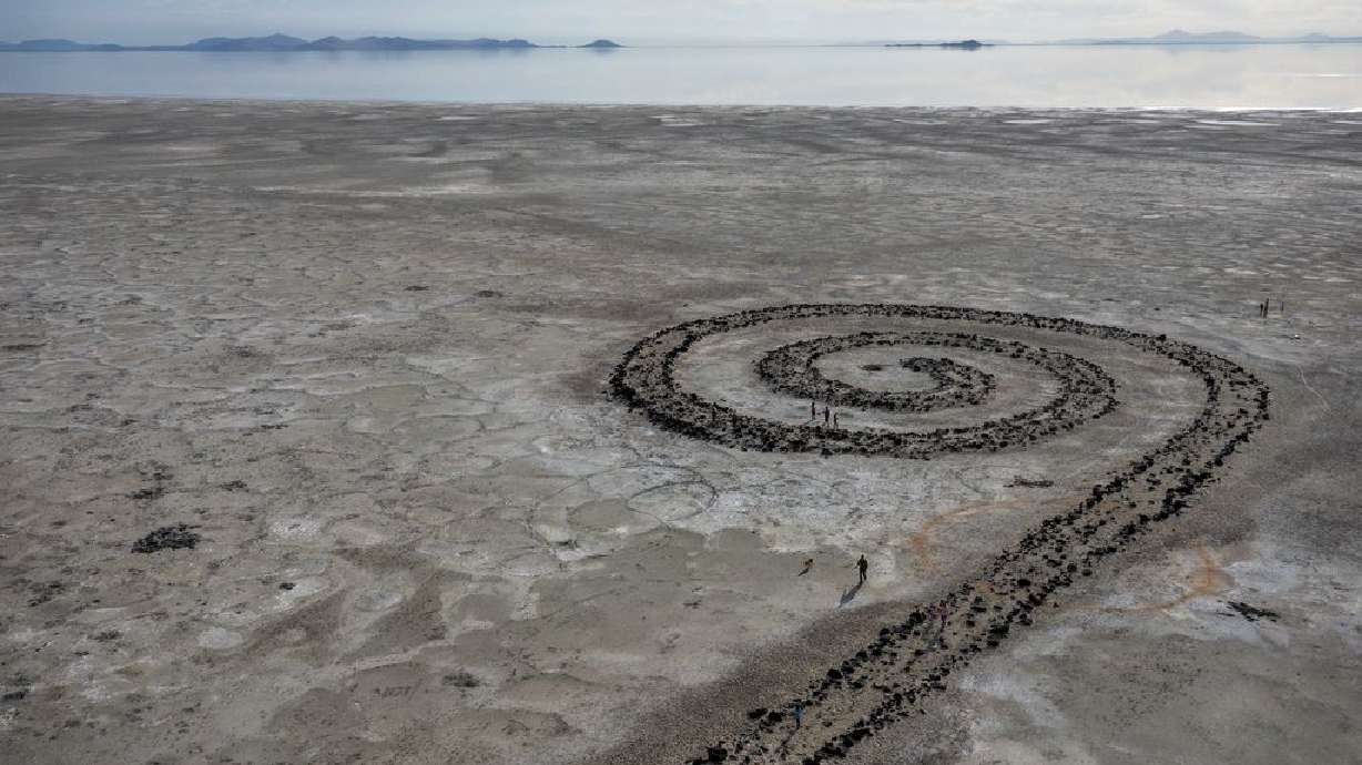People explore the Spiral Jetty, just south of the Rozel Point peninsula on the northeastern shore, March 25.