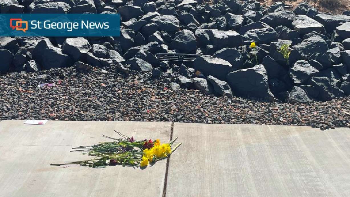 Flowers are placed at scene of rollover on Tech Ridge Drive near Cloud Drive that took the life of 15-year-old passenger, St. George, Utah, on Sunday.