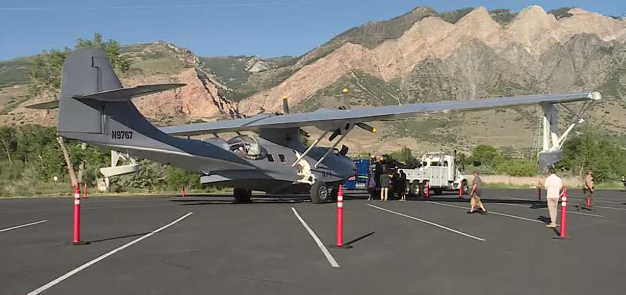 A PBY-5A airplane is shown after a semitruck helped tow it out of the harbor Monday at Willard Bay.