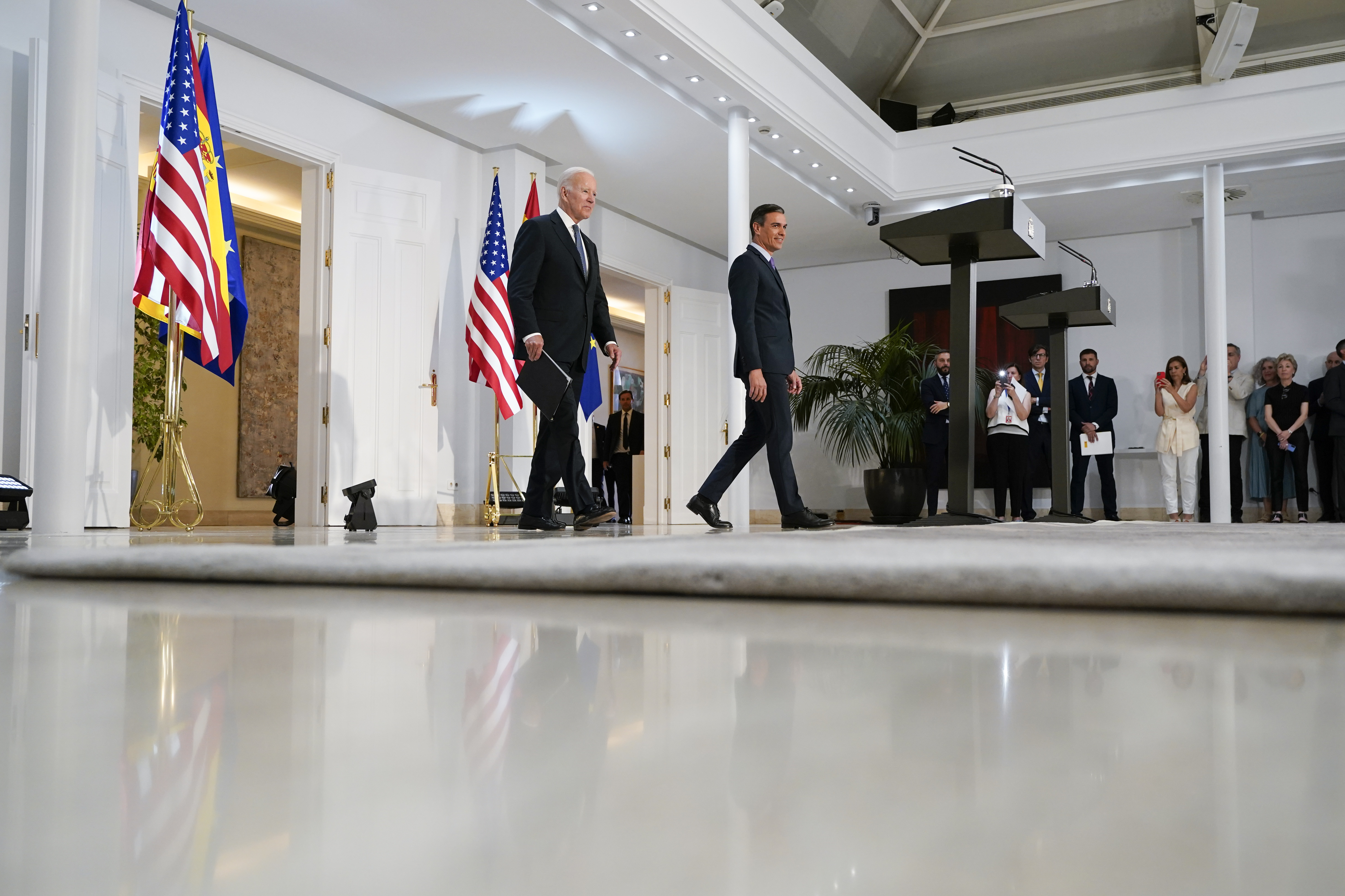 President Joe Biden and Spain's Prime Minister Pedro Sanchez arrive to speak at the Palace of Moncloa in Madrid, Tuesday. Biden will also be attending the North Atlantic Treaty Organization summit in Madrid.
