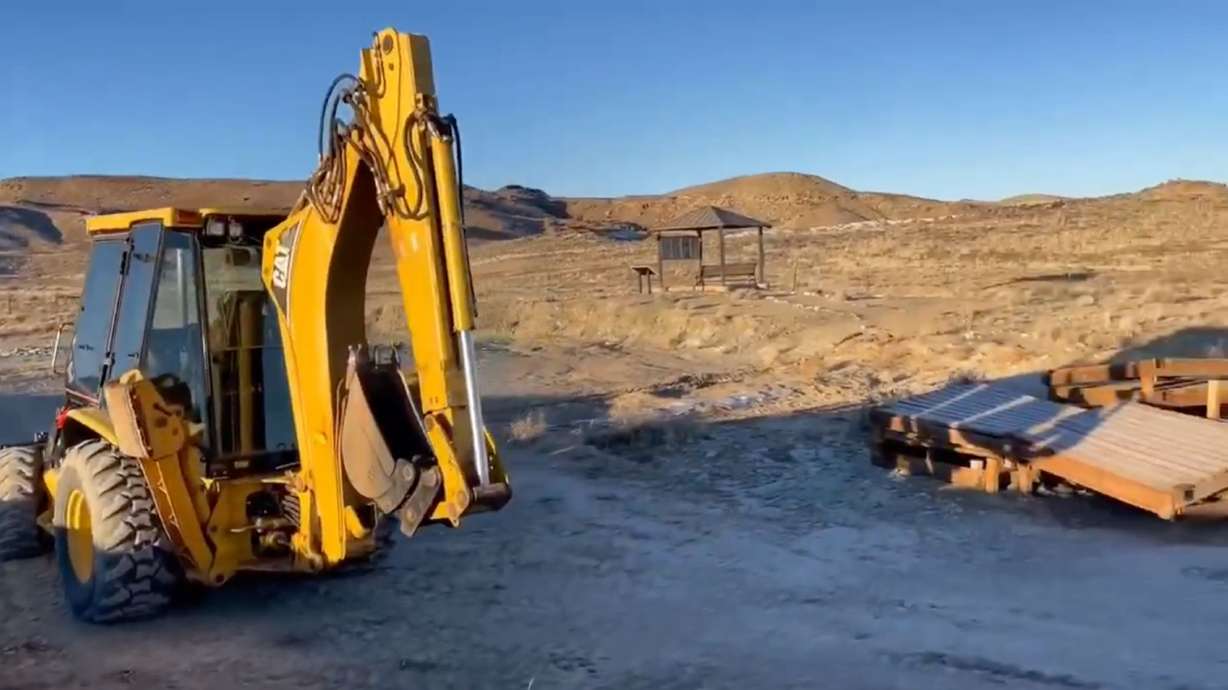A screenshot from a video given to the Deseret News by the Utah Friends of Paleontology shows a backhoe and the torn-up boardwalk in Mill Canyon outside of Moab.