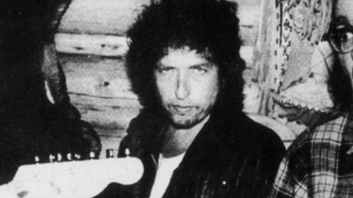 Bob Dylan plays music alongside Bill Briggs at a performance in Utah sometime between 1965 and 1975. Dylan's 1976 performance in Salt Lake City remains a mystery to his biggest fans; some call lost recordings of the show the "Holy Grail" of his untaped shows.