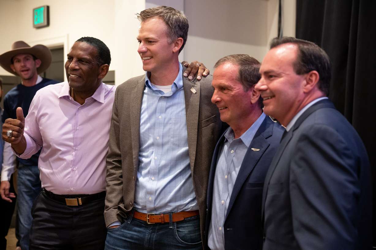 Rep. Burgess Owens, Rep. Blake Moore, Rep. Chris Stewart and Sen. Mike Lee, all Utah Republicans, pose for photos at the Awaken Event Center in South Jordan after each won their primary race on Tuesday.