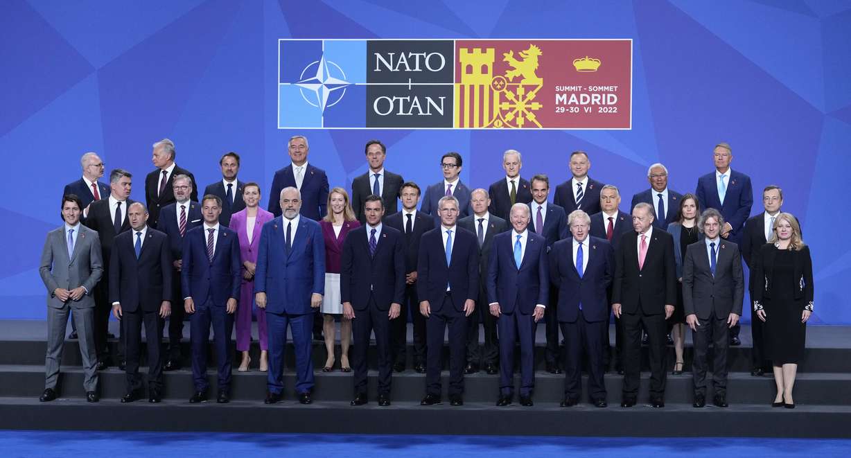 NATO leaders pose for a group photo following the official welcome for the NATO summit in Madrid, Spain, on Wednesday. North Atlantic Treaty Organization heads of state will meet for a NATO summit in Madrid from Tuesday through Thursday.