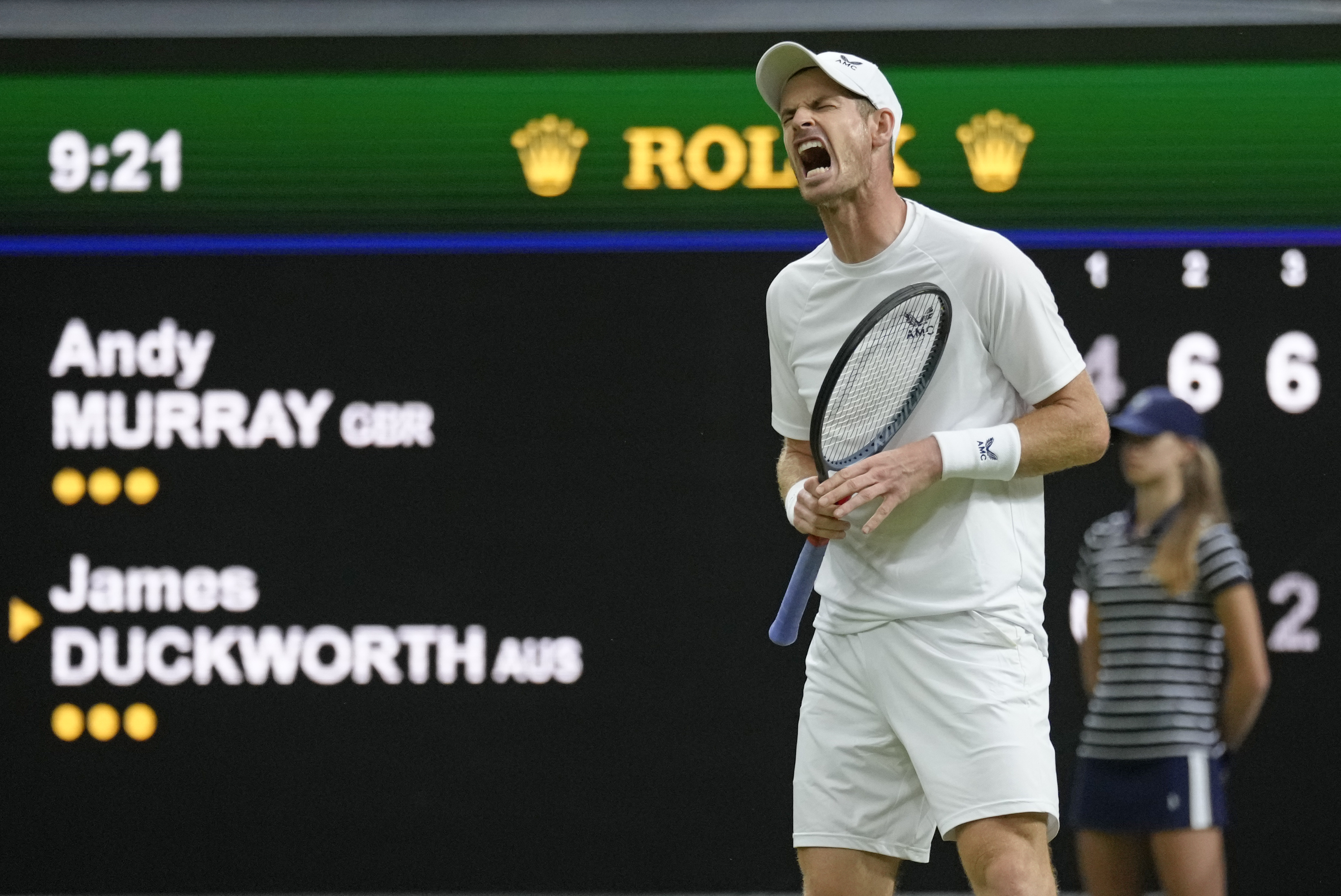 Britain's Andy Murray reacts after losing a point against Australia's James Duckworth in a first round men's singles match on day one of the Wimbledon tennis championships in London, Monday, June 27, 2022. 