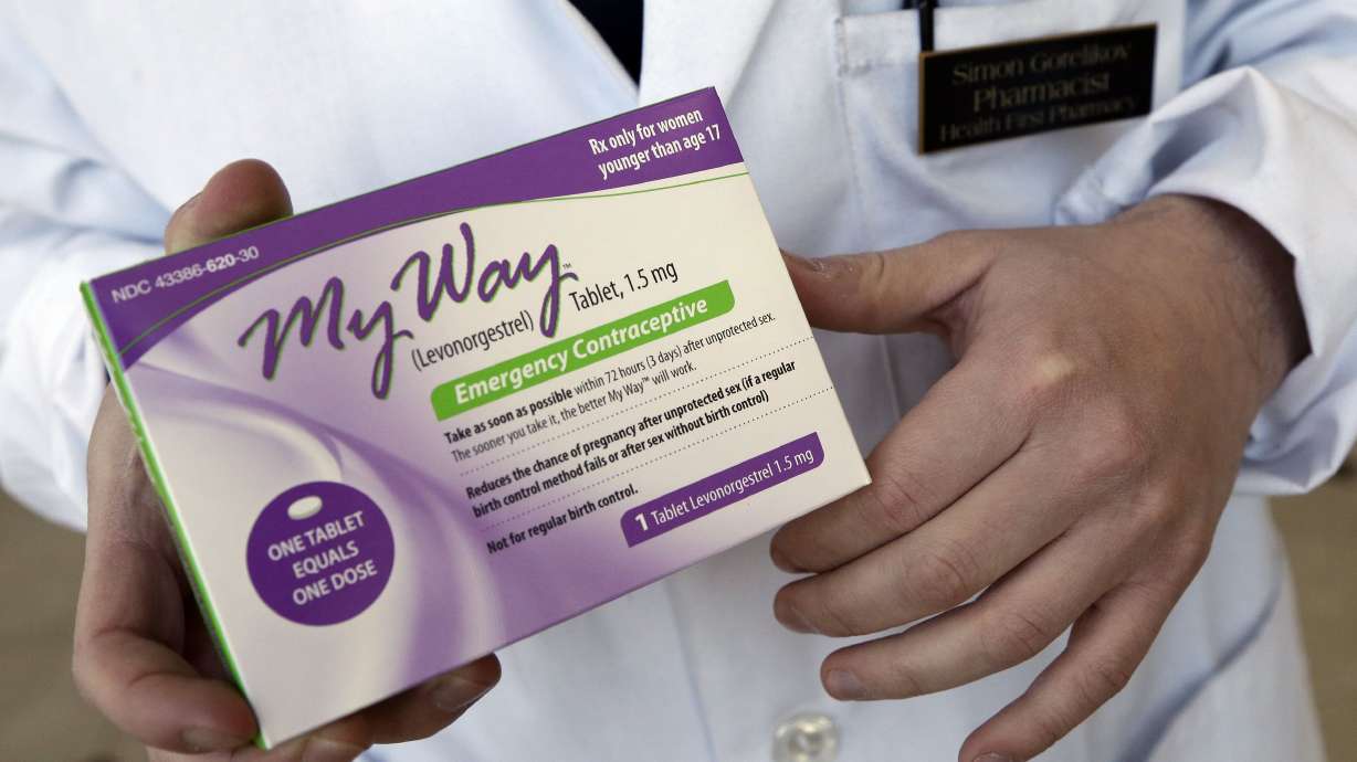 Pharmacist Simon Gorelikov holds a generic emergency contraceptive, also called the morning-after pill, at the Health First Pharmacy in Boston on May 2, 2013. Since the Supreme Court’s ruling to overturn Roe v. Wade, Facebook and Instagram have begun to remove posts offering abortion pills to those who may no longer have access to abortion care.