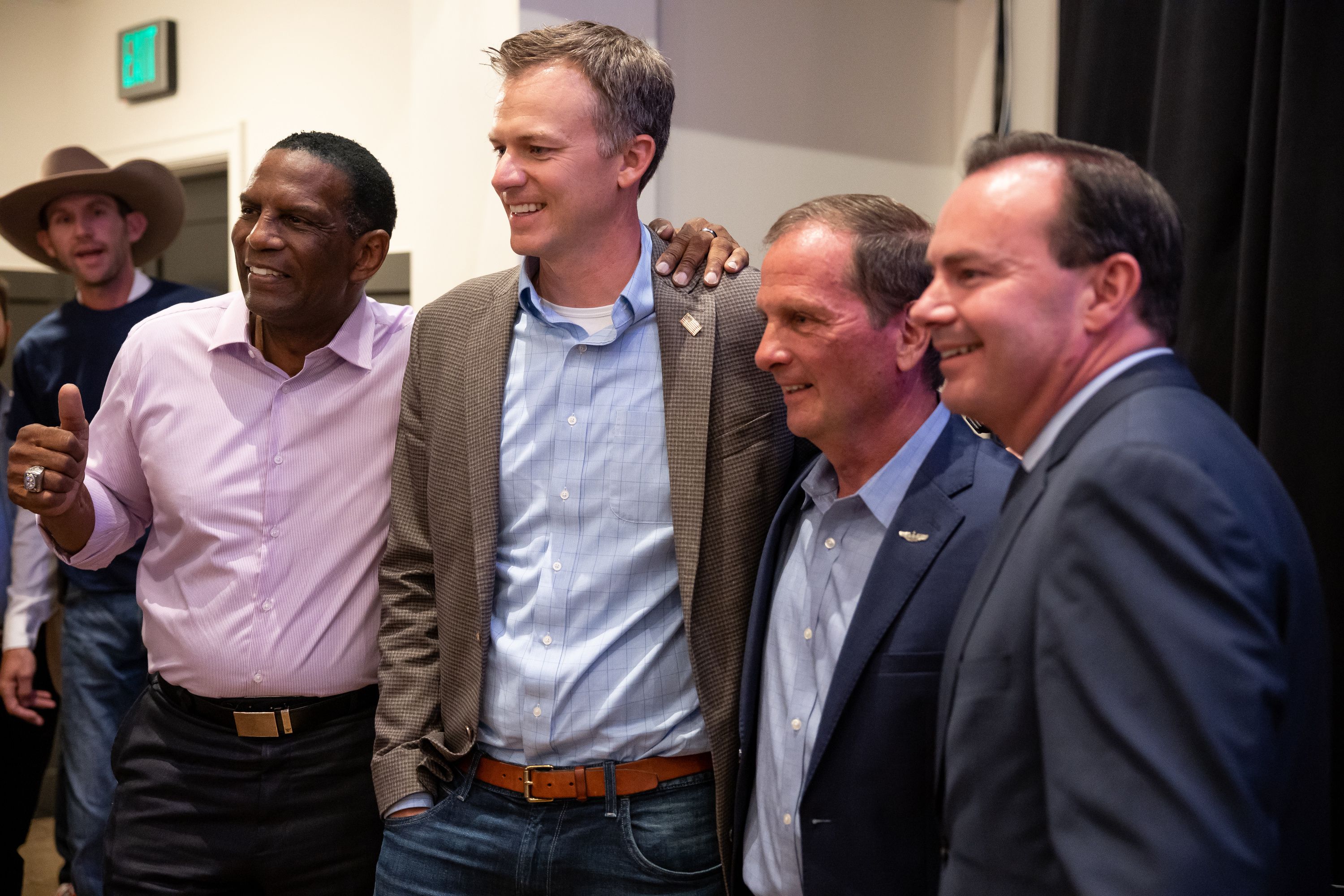 Rep. Burgess Owens, Rep. Blake Moore, Rep. Chris Stewart and Sen. Mike Lee, all Utah Republicans, pose for photos at the Awaken Event Center in South Jordan after each won their primary race on Tuesday.
